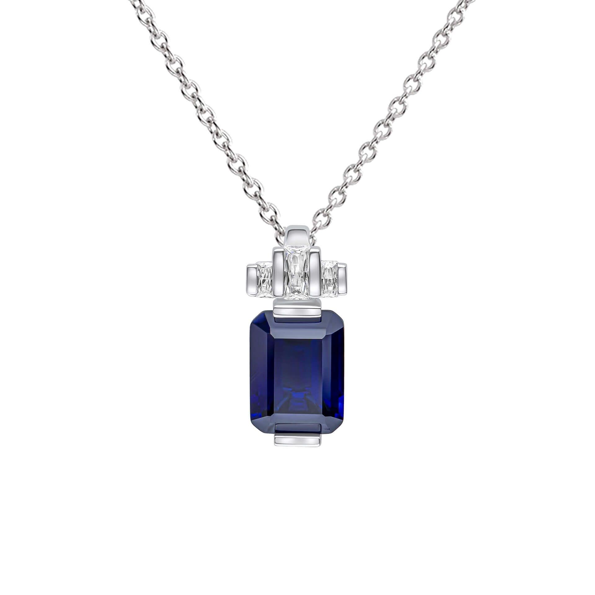 "Diamonfire® Sapphire Blue Emerald Cut Zirconia Pendant – deep blue centre with clear halo in triple plated sterling silver. Presented in luxury silk packaging from Gold and Diamonds."