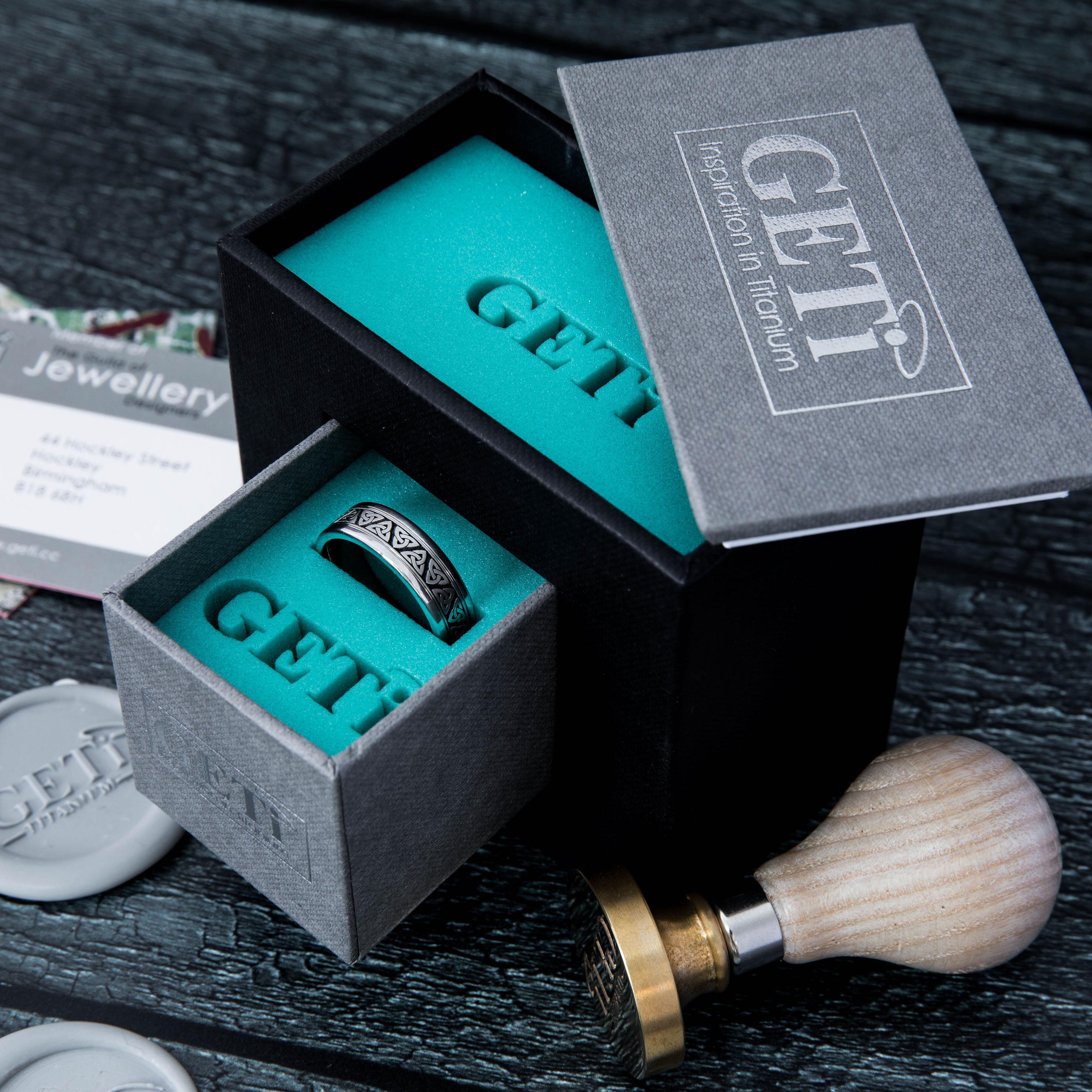 Geti titanium wedding band with infinity pattern, matt centre and polished edges by Gold and Diamonds