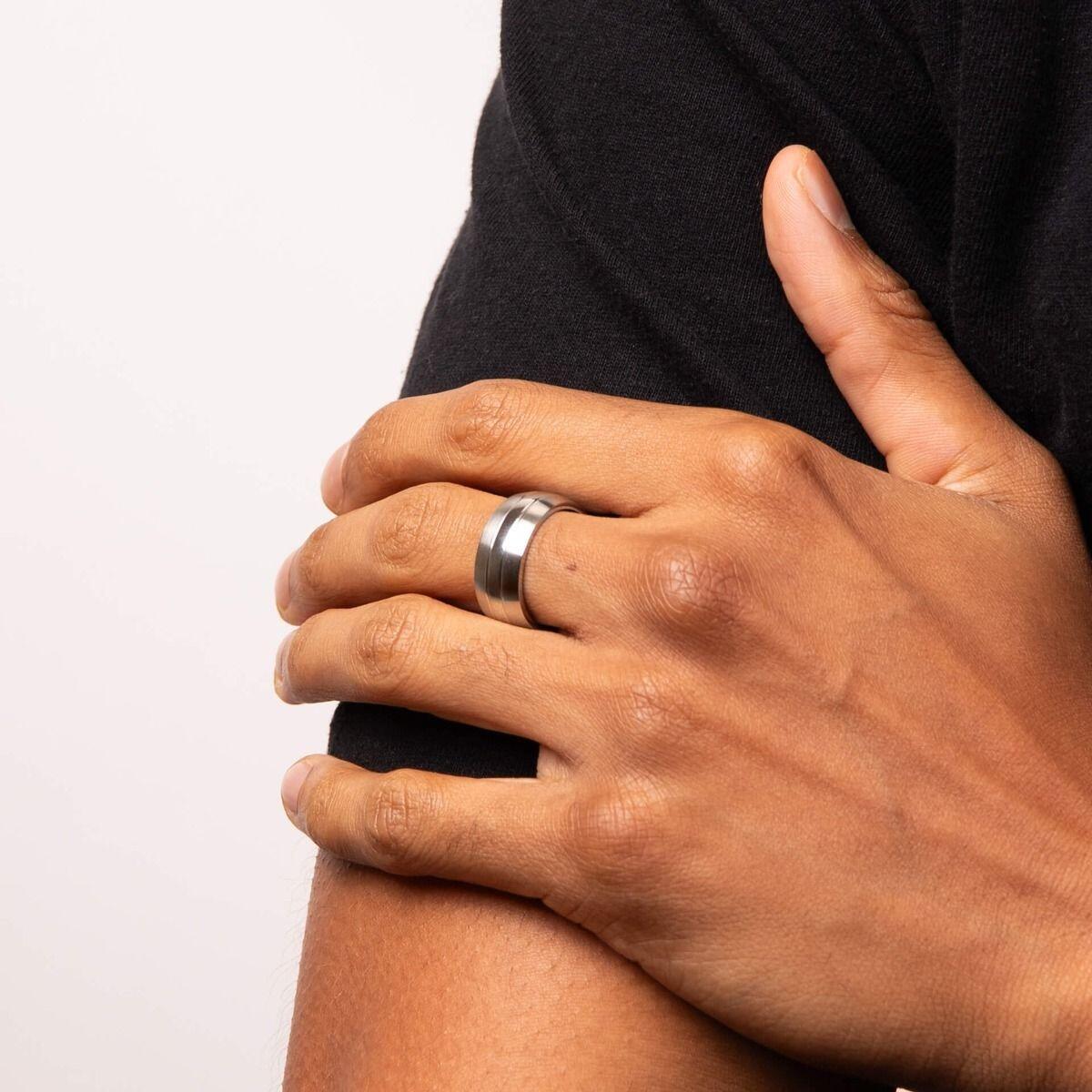 "9mm Stainless Steel Ring with polished inner band and spinning brushed outer bands, AnchorCert Pro certified skin safe, in fredbennett® branded packaging."