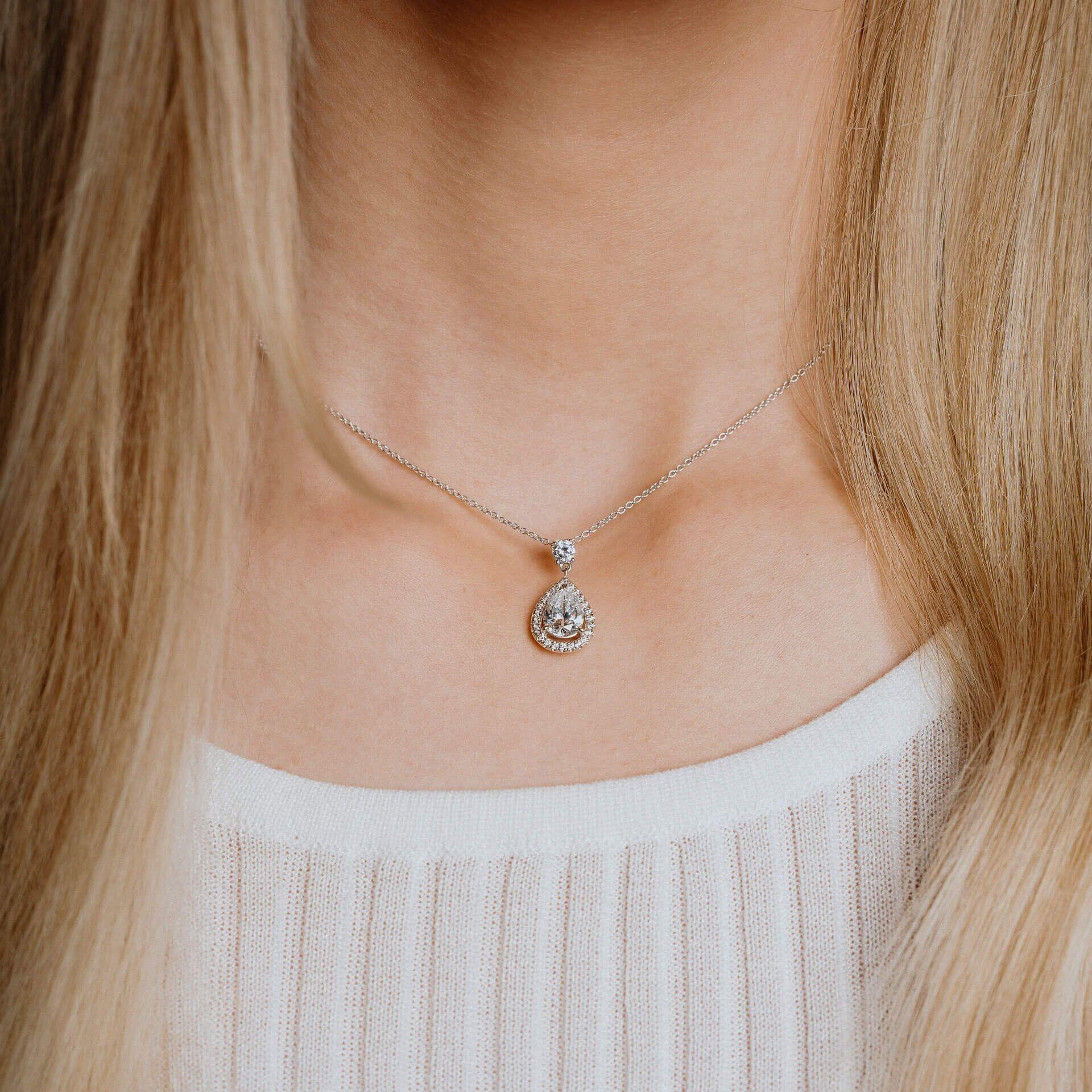 "Diamonfire® 2.33ct Teardrop-Shaped Zirconia Pendant in triple plated sterling silver, 57-facet stone, AnchorCert Pro certified skin safe, presented in luxury silk packaging with gift bag—perfect for brides and formal occasions."