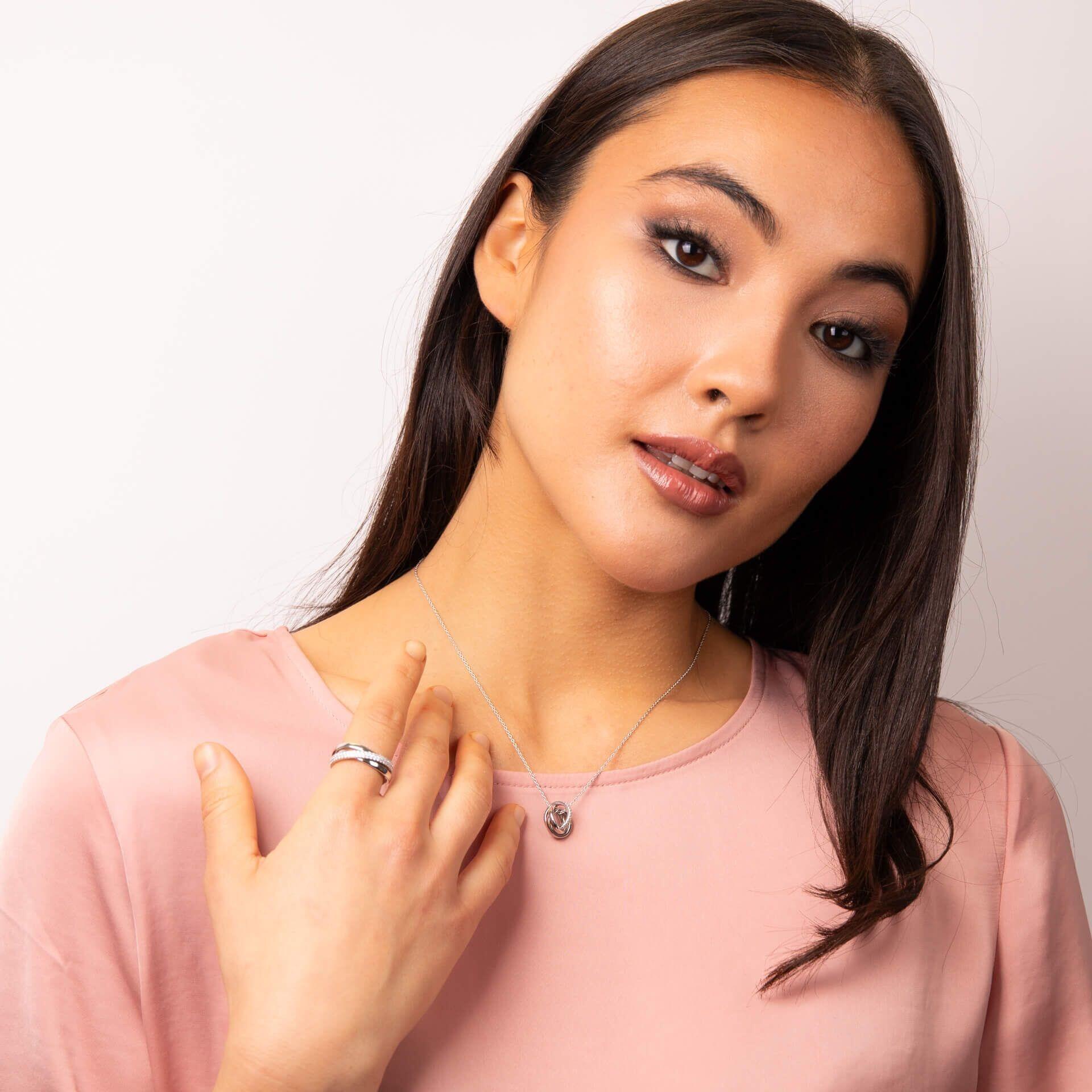 1.02ct Diamonfire® Triple Twist Ring, crafted in sterling silver with triple plating, featuring brilliant-cut zirconia stones with 57 facets, beautifully presented in exclusive Diamonfire® silk packaging, including a luxury gift box and bag.