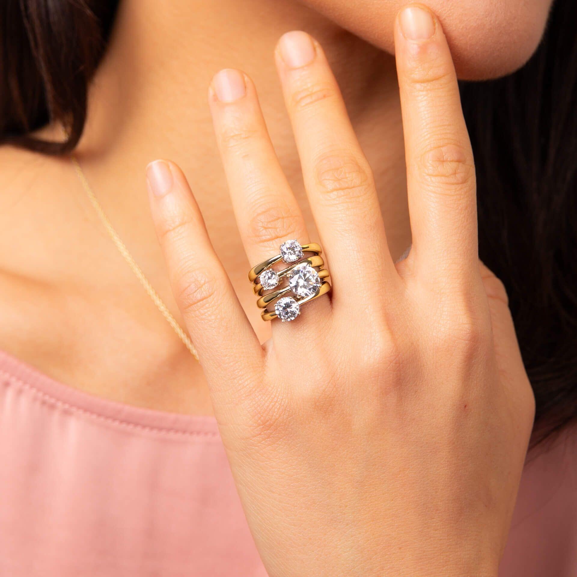 Diamonfire® 2ct Solitaire Ring with 4 Claw Setting in Sterling Silver, available in Platinum or 24K Gold Plated Triple Finish, presented in exclusive Diamonfire® silk packaging with a luxury gift box and bag.