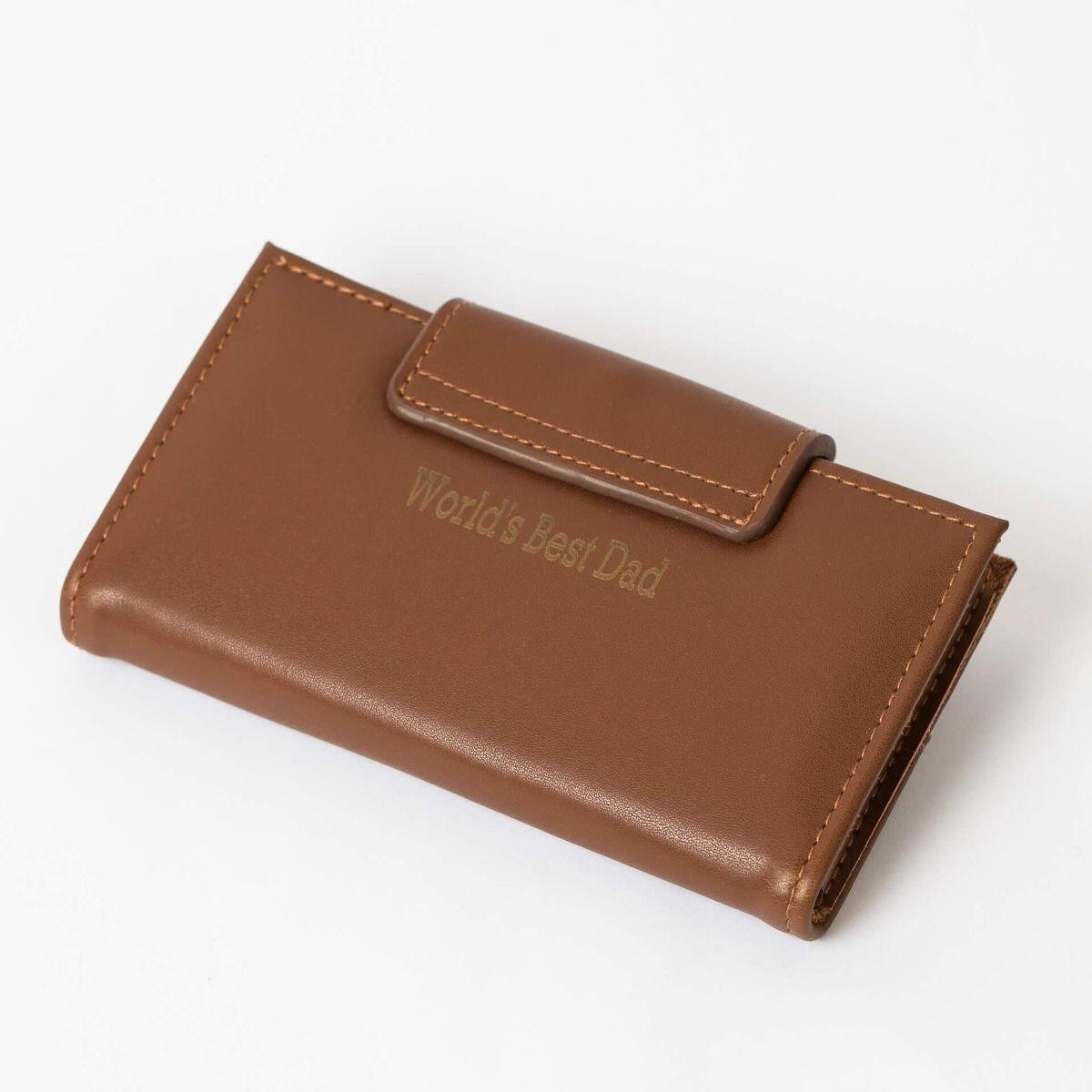 "fredbennett® Brown Leather and Stainless Steel Travel Manicure Set – a compact, durable grooming kit in an engravable leather case. Includes scissors, clippers, and tweezers. Ideal gift for travellers, dads, and groomsmen. Available at Gold and Diamonds."
