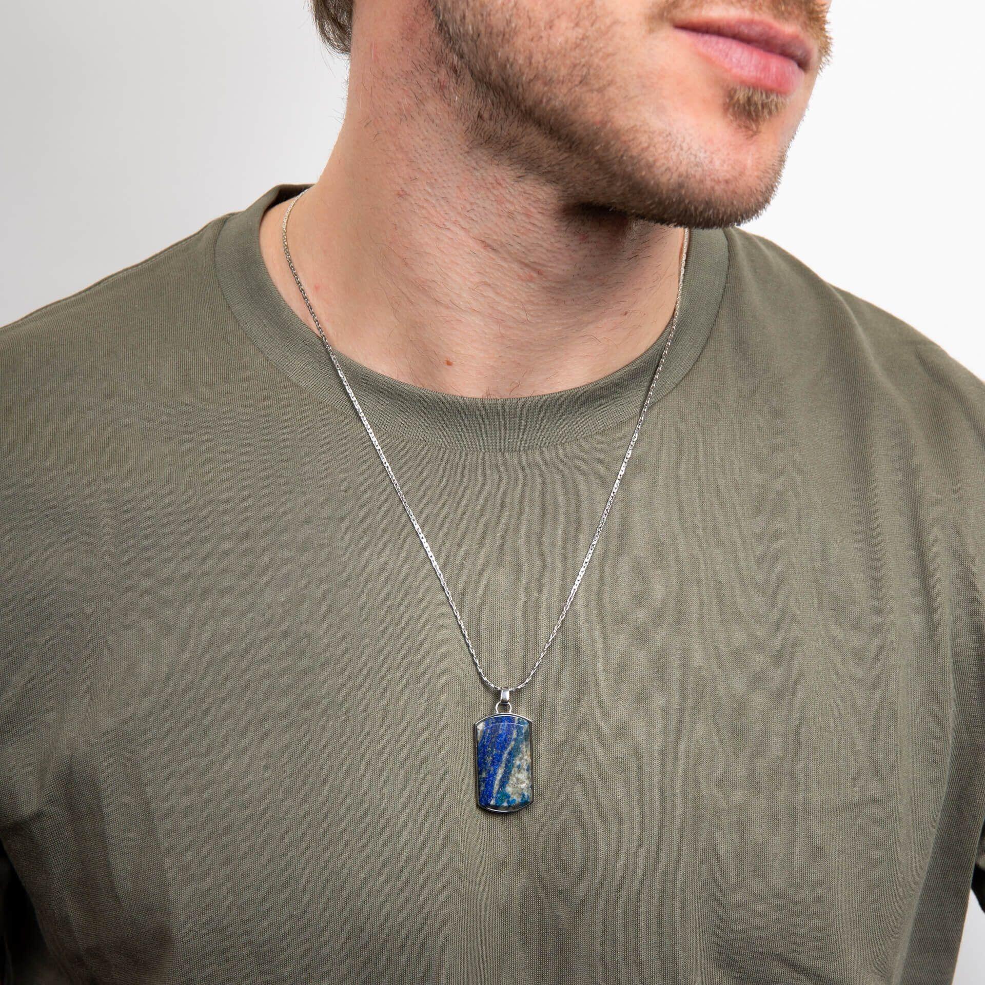 "fredbennett® Lapis Lazuli Dog Tag Pendant – features a deep blue natural lapis inlay with an engravable stainless steel back. Skin-safe and presented in a suede pouch. Available at Gold and Diamonds."