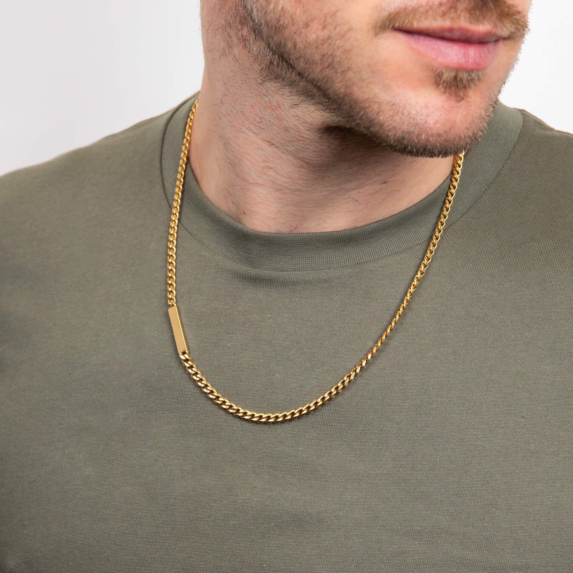"fredbennett® Yellow Gold PVD Stainless Steel Curb Chain Necklace – features engravable ID bar and warm gold plating. Skin-safe and presented in a suede pouch. Available at Gold and Diamonds."