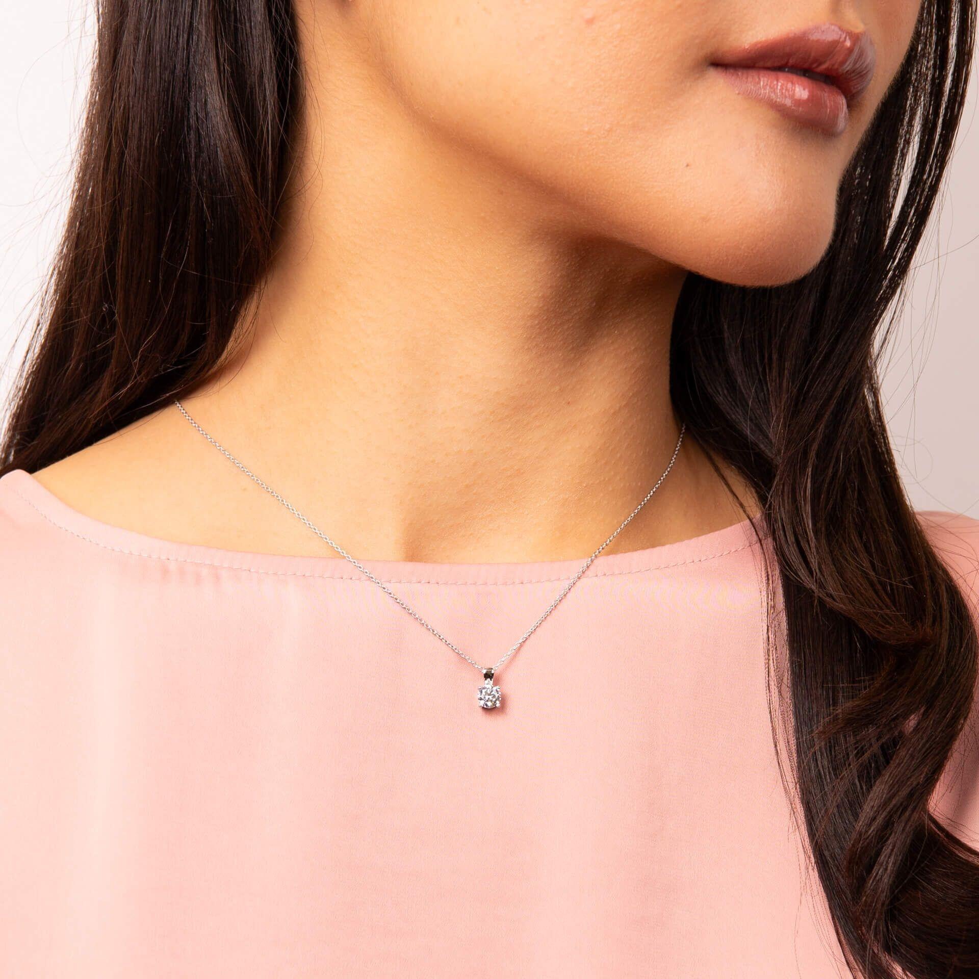 "Diamonfire® Four Claw Solitaire Pendant with 57-facet zirconia stone, available in 0.50ct to 2.00ct, crafted in triple plated sterling silver, AnchorCert Pro certified skin safe, presented in luxury silk packaging—ideal for brides and special occasions."