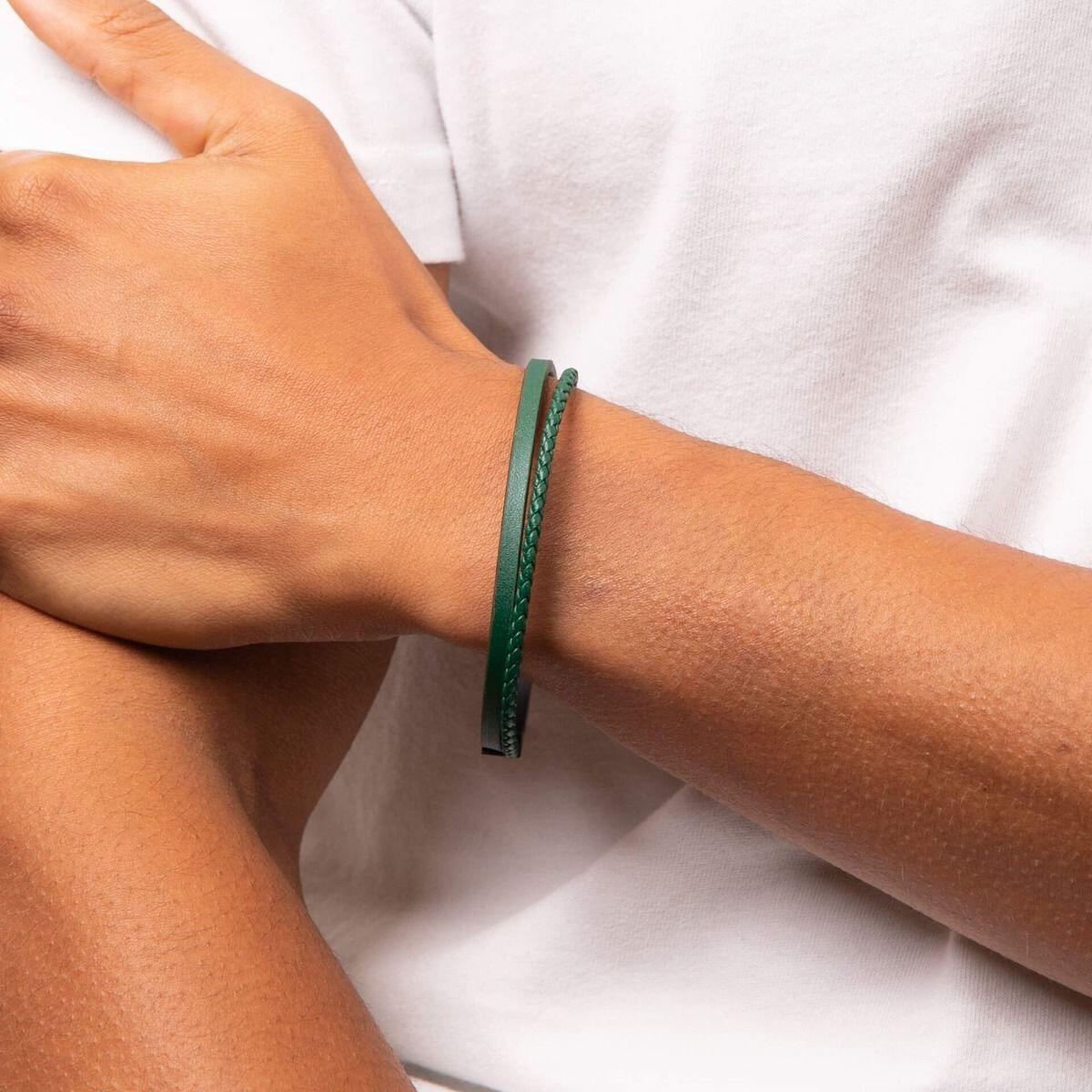 "fredbennett® Multi-Row Green Recycled Leather & Stainless Steel Bracelet – A stylish and sustainable men’s bracelet featuring a multi-texture design with plain and plaited green recycled leather, secured with a black IP stainless steel clasp. AnchorCert® certified and presented in luxury suede packaging from Gold and Diamonds."