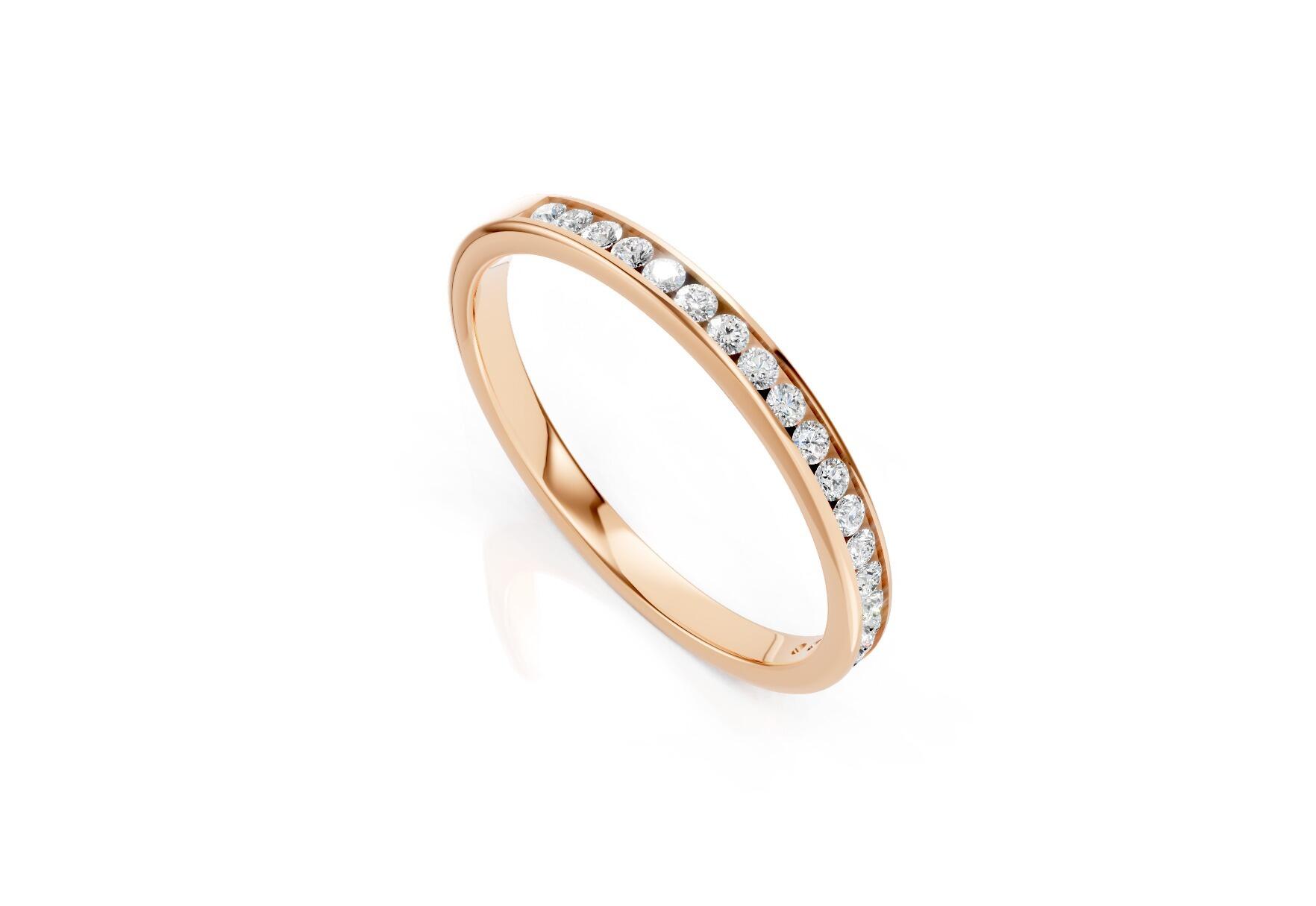 2mm channel set diamond wedding band 0.15ct round diamonds 50 percent set in gold platinum and palladium