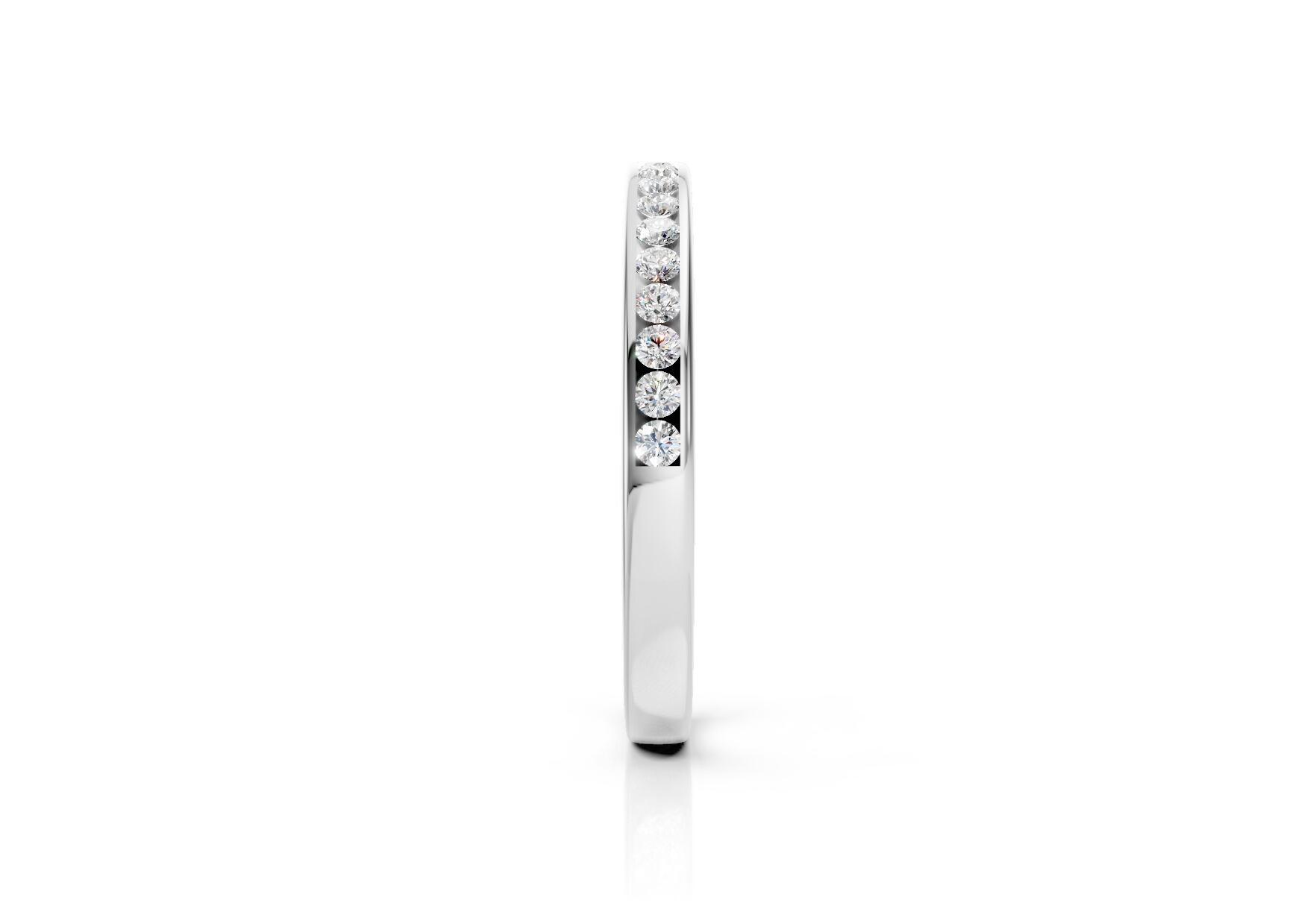 2.2mm channel set diamond wedding band 0.20ct round diamonds 50 percent set in gold platinum and palladium