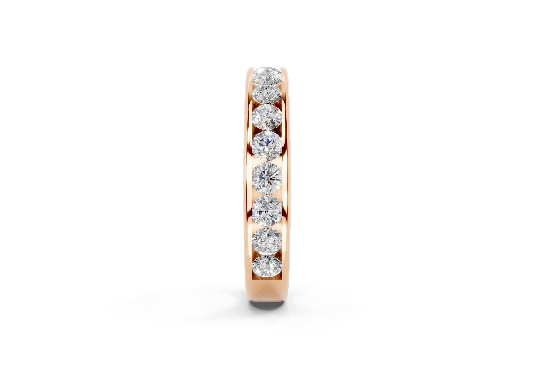 3.7mm channel set diamond wedding ring with 0.75ct round diamonds, 50% set for added sparkle. Available in gold, platinum and palladium. Natural G/VS or lab D/VVS1 diamonds. Free home consultations.
