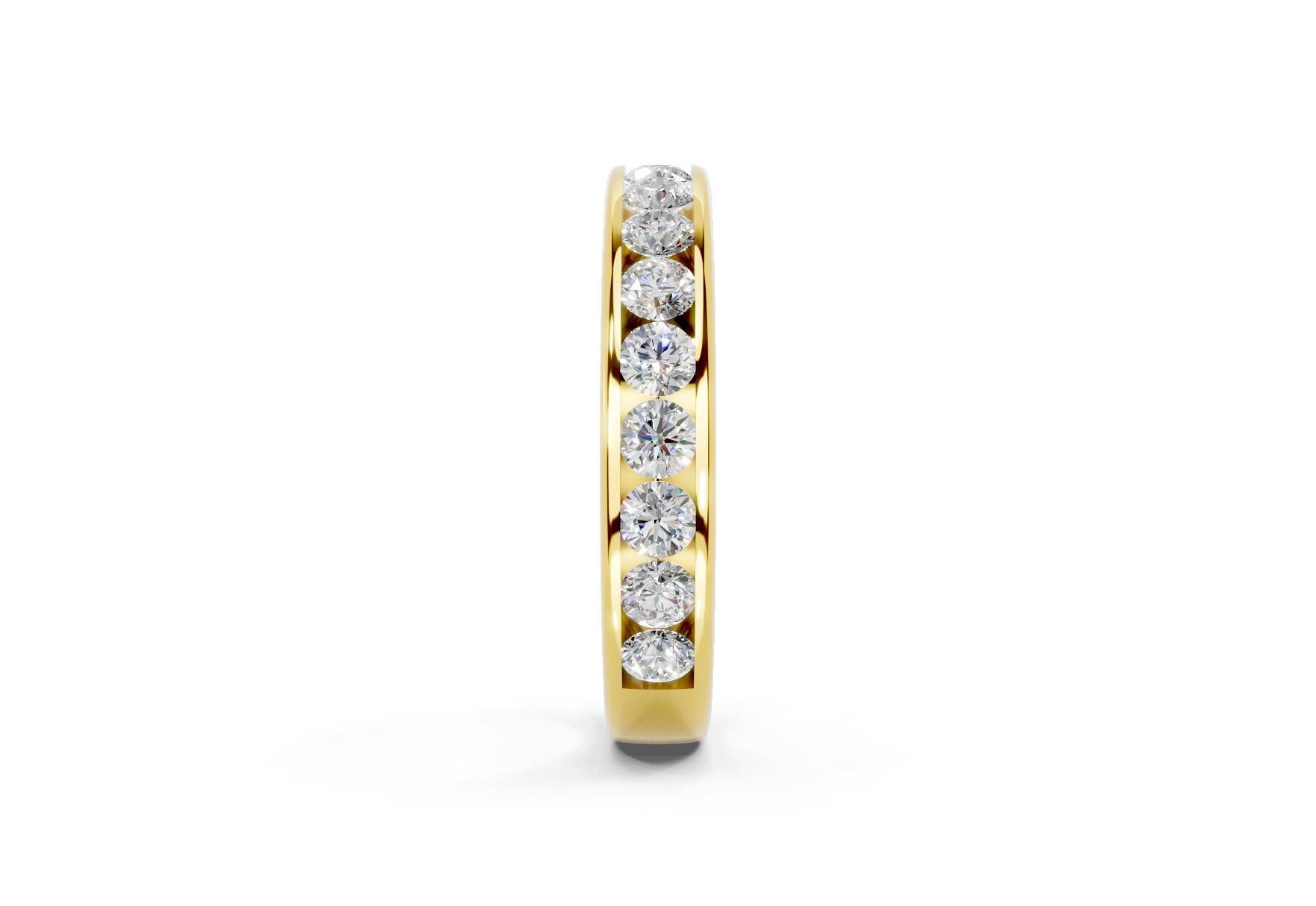 3.7mm channel set diamond wedding ring with 0.75ct round diamonds, 50% set for added sparkle. Available in gold, platinum and palladium. Natural G/VS or lab D/VVS1 diamonds. Free home consultations.
