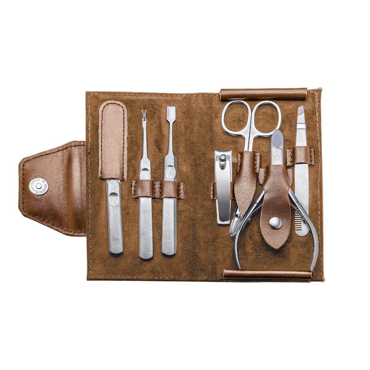 "fredbennett® Brown Leather and Stainless Steel Travel Manicure Set – a compact, durable grooming kit in an engravable leather case. Includes scissors, clippers, and tweezers. Ideal gift for travellers, dads, and groomsmen. Available at Gold and Diamonds."