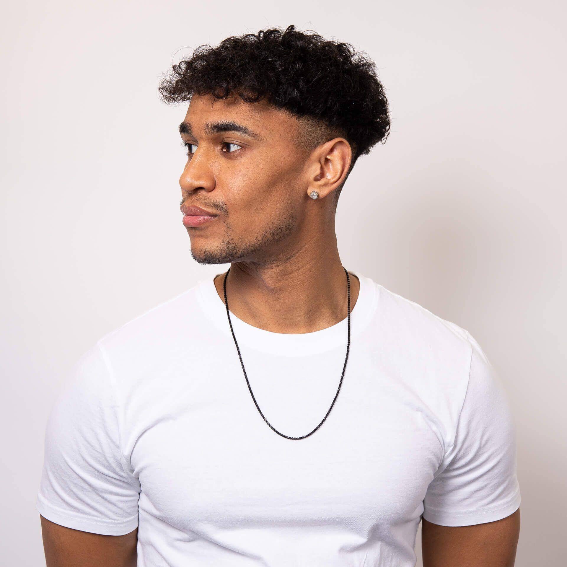"fredbennett® Black IP Stainless Steel Box Chain Necklace – bold interlocking chain symbolising unity, with sleek black finish and 61cm length. Skin-safe and presented in a suede pouch from Gold and Diamonds."