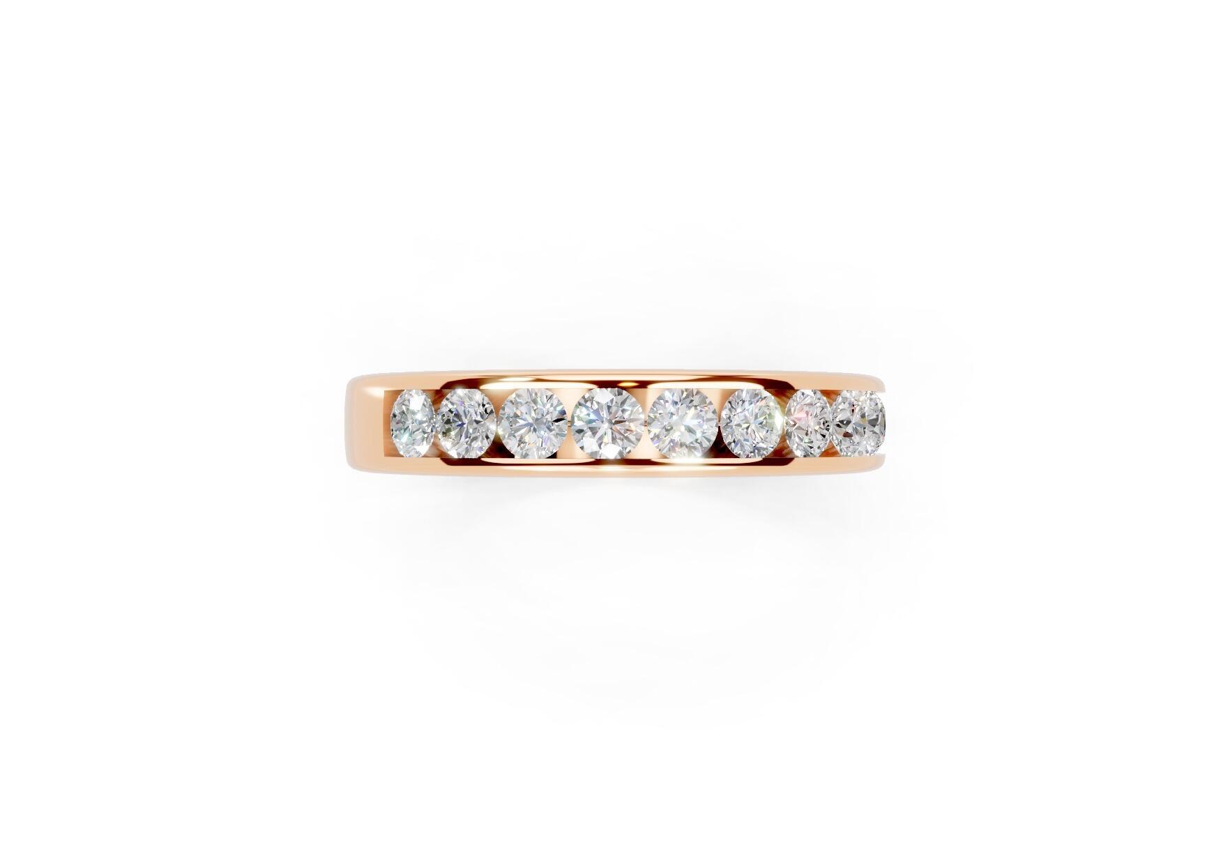 3.7mm channel set diamond wedding ring with 0.75ct round diamonds, 50% set for added sparkle. Available in gold, platinum and palladium. Natural G/VS or lab D/VVS1 diamonds. Free home consultations.