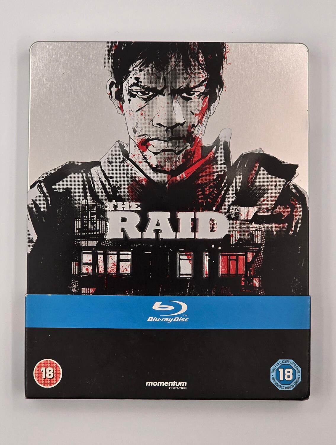 The Raid - Play.com Exclusive Steelbook - Blu-Ray - Region B - [Pre-owned] - Momentum - Item Image 1