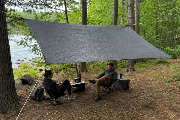 Tent groundsheet reused a s a tarp shelter