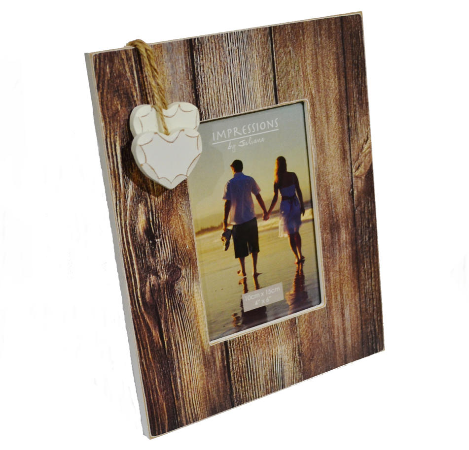 Distressed wood photo frame with hanging hearts