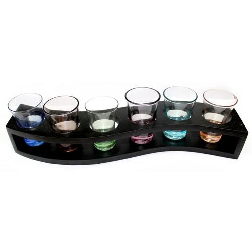 Six shot glasses in wavy wood tray