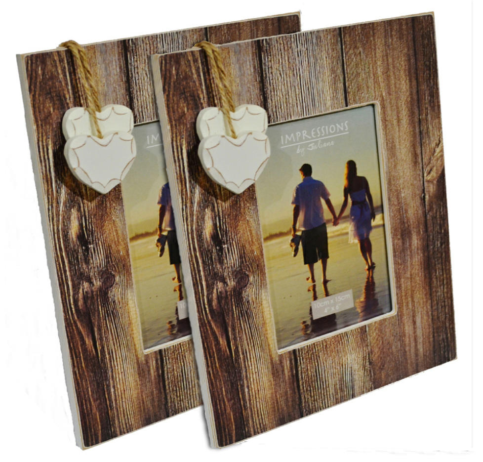 Pair of distressed wood photo frames with hanging hearts