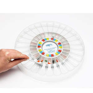 Alternative view of person filling dispenser using filler tray