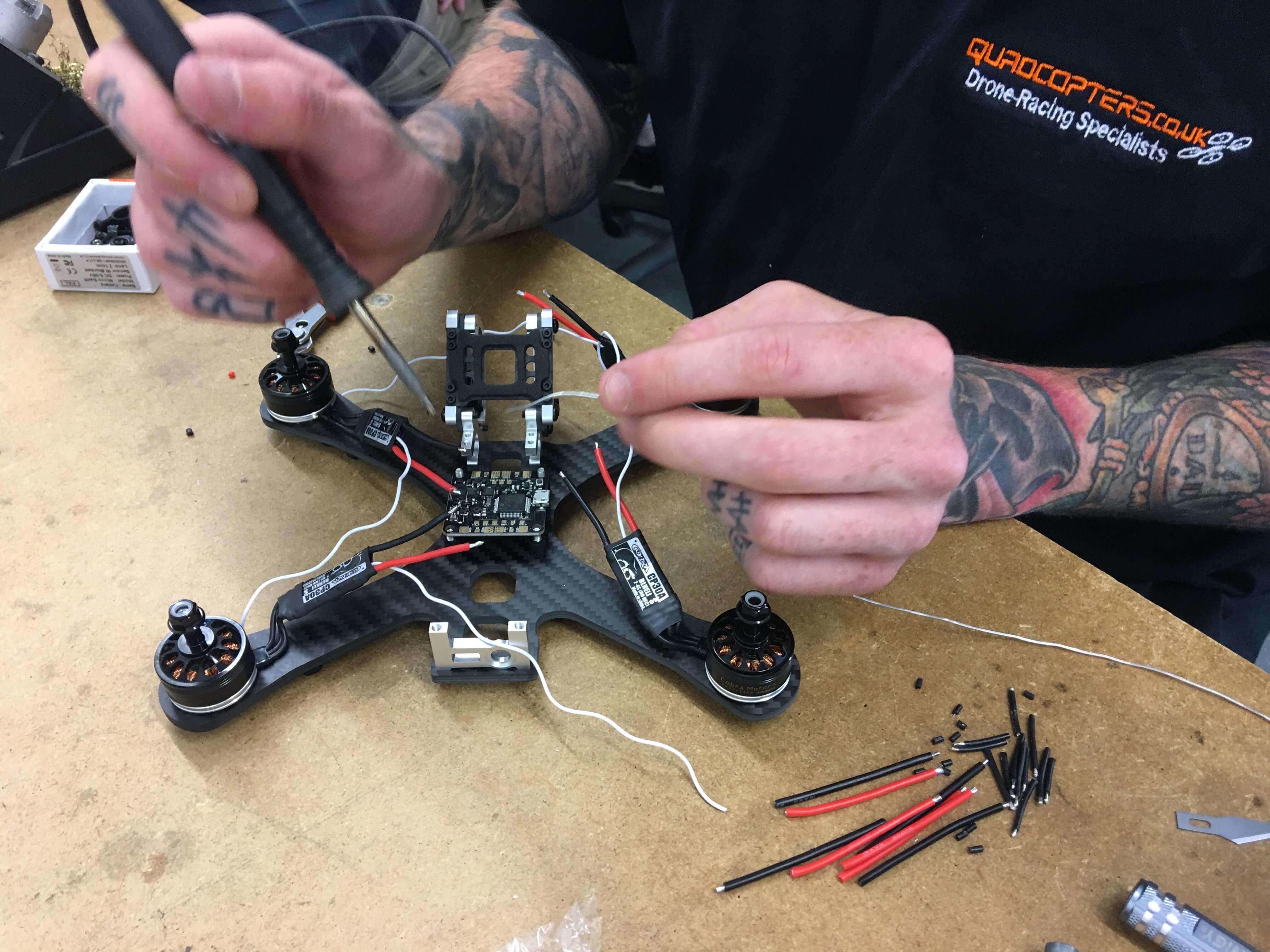 Tom Smith FPV soldering esc's to CL Racing F4 FC