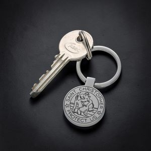 Personalised Silver Saint Christopher Keyring on dark background