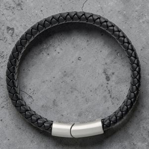 St Christopher medallion charm close-up on Safe Travels leather bracelet, sterling silver