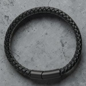 Black St Christopher leather bracelet birds eye view showing chunky wide band design