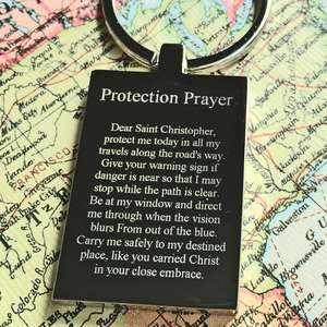Mirror Polished Steel St Chrisopher Keyring with a prayer for travelers.