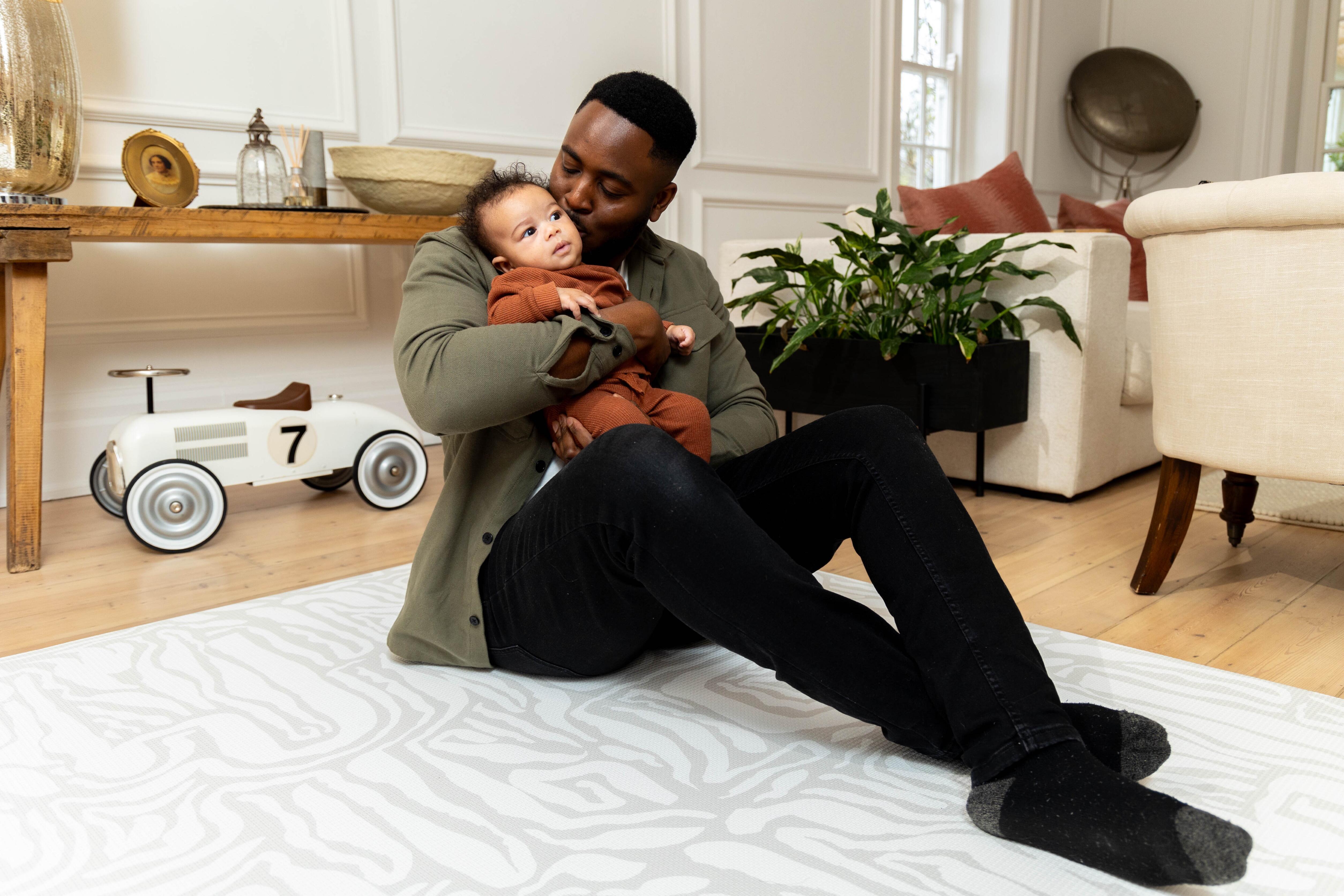 Lifestyle image of Pathway Grey reversible playmat – large non-toxic foam baby mat complementing Scandi-style nurseries