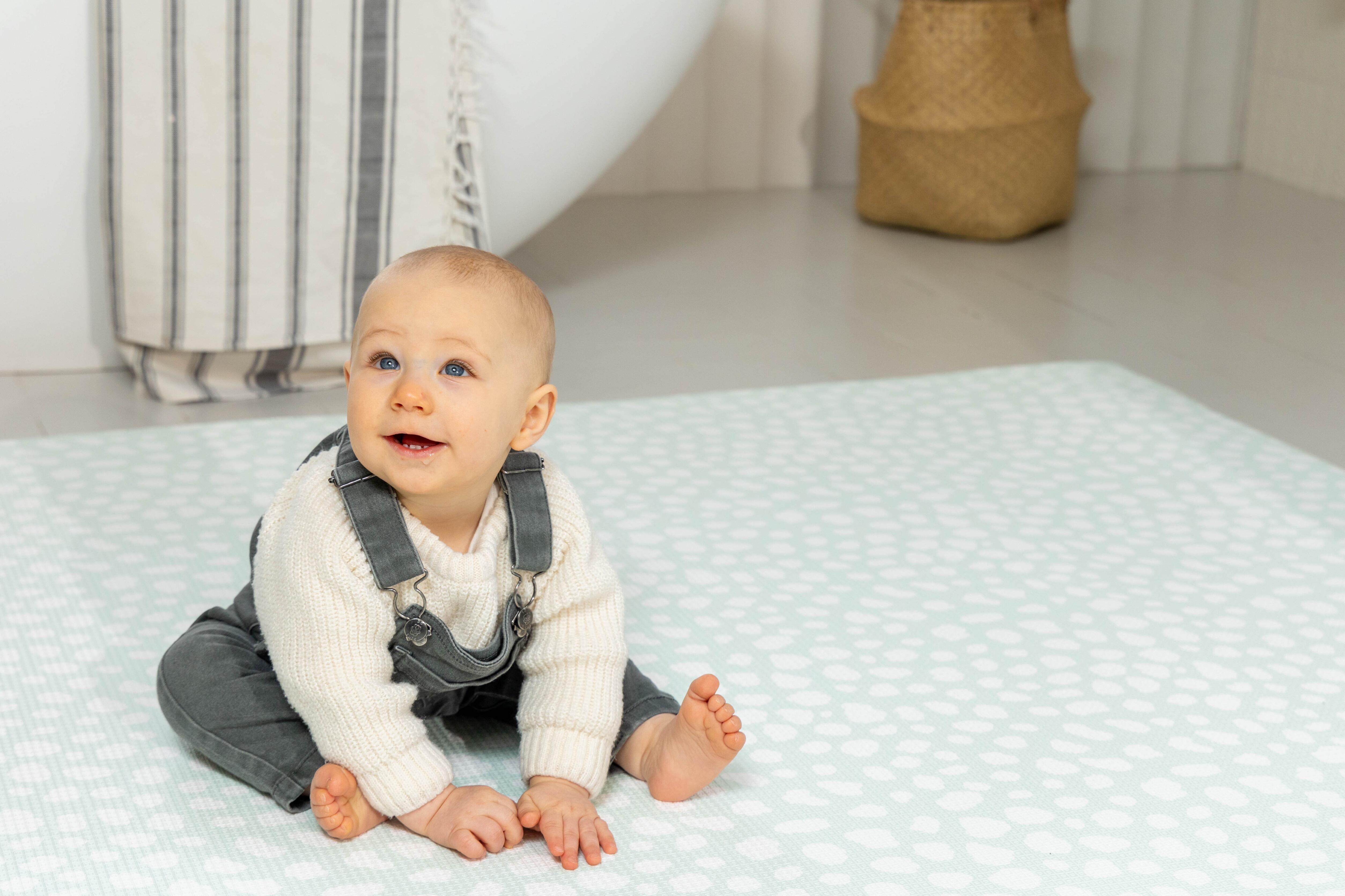 Medium-sized Darling Dalmatian Playmat in Soft Mint for modern interiors