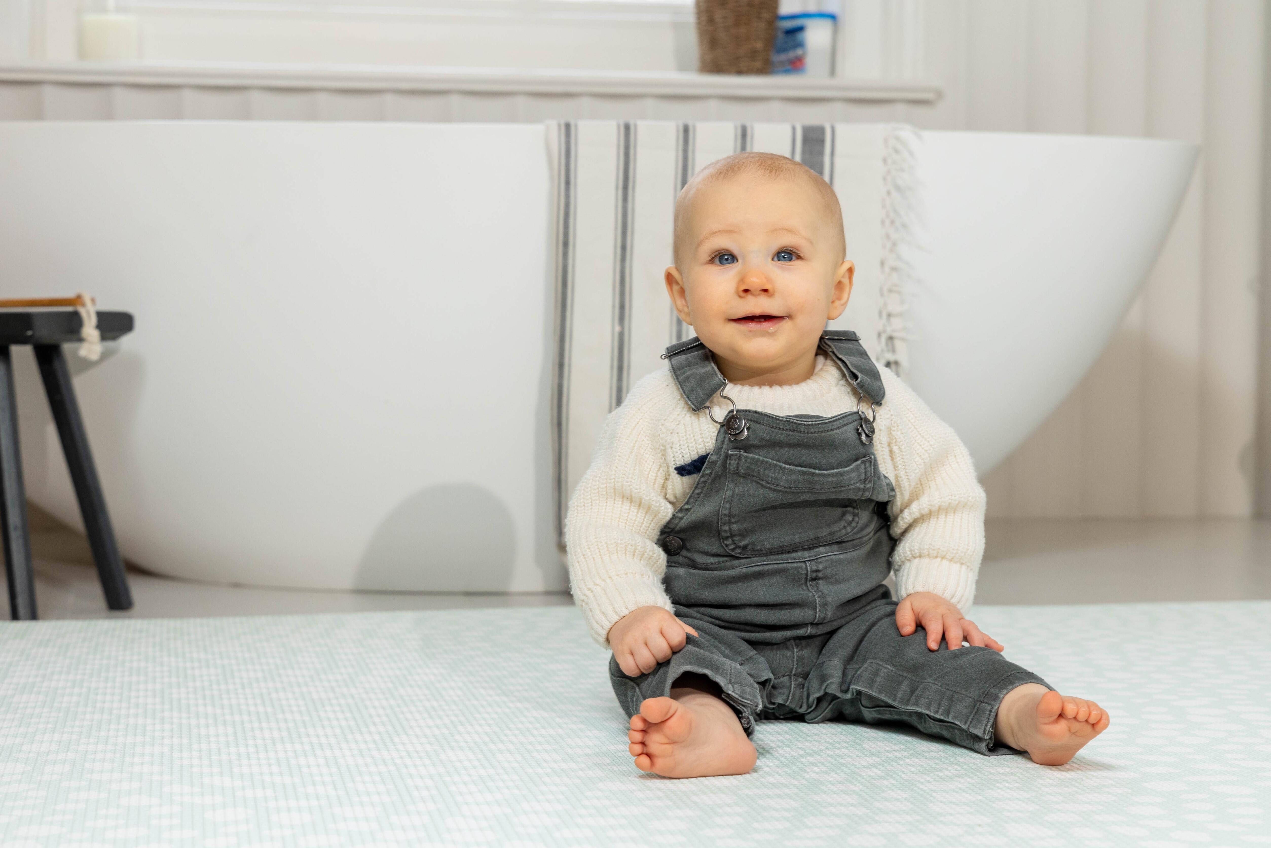 Lifestyle photo of Soft Mint Darling Dalmatian playmat – reversible non-toxic foam mat for contemporary interiors