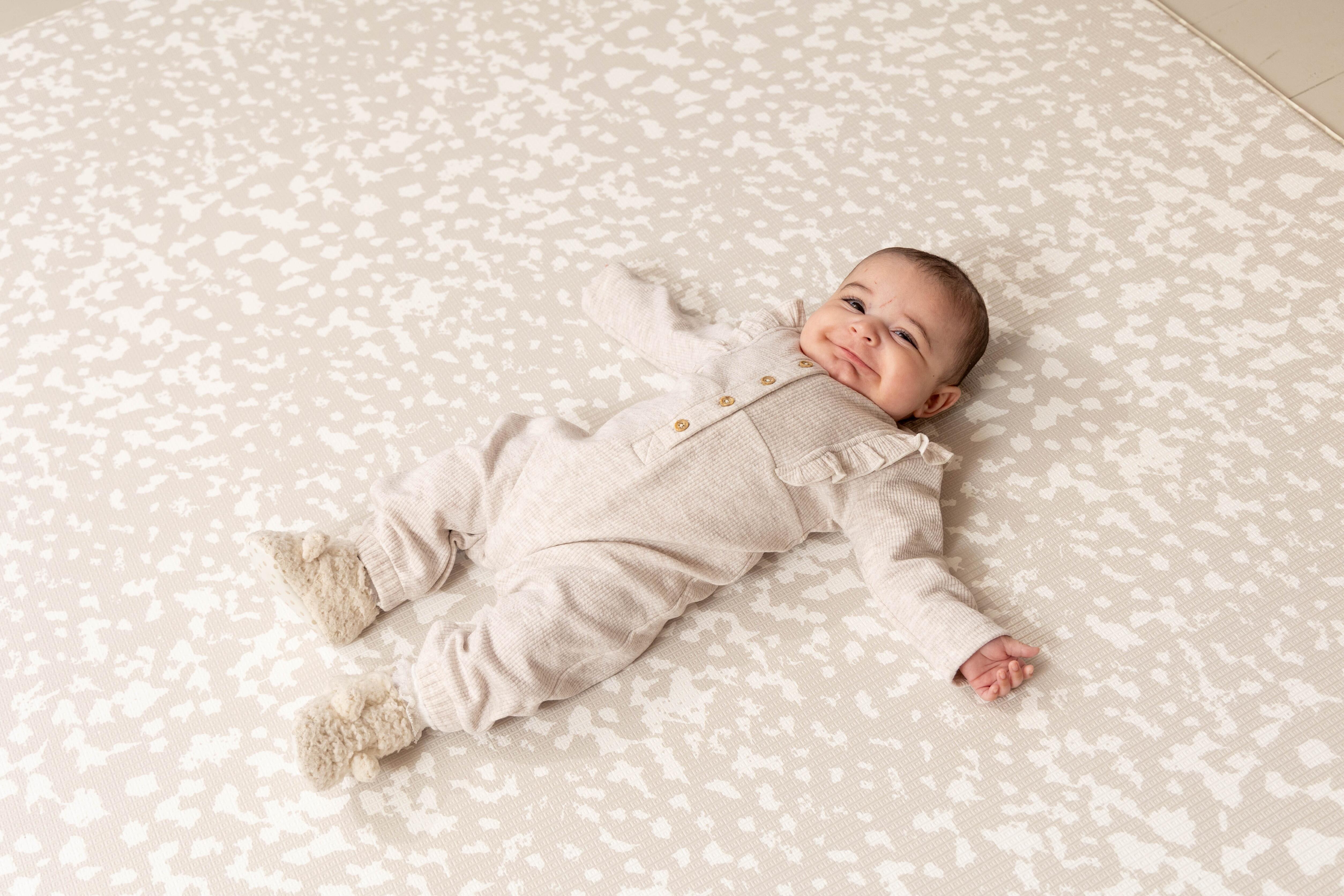 Luxury Greige reversible baby playmat – elegant Speckled Kisses design crafted from cushioned eco-friendly foam