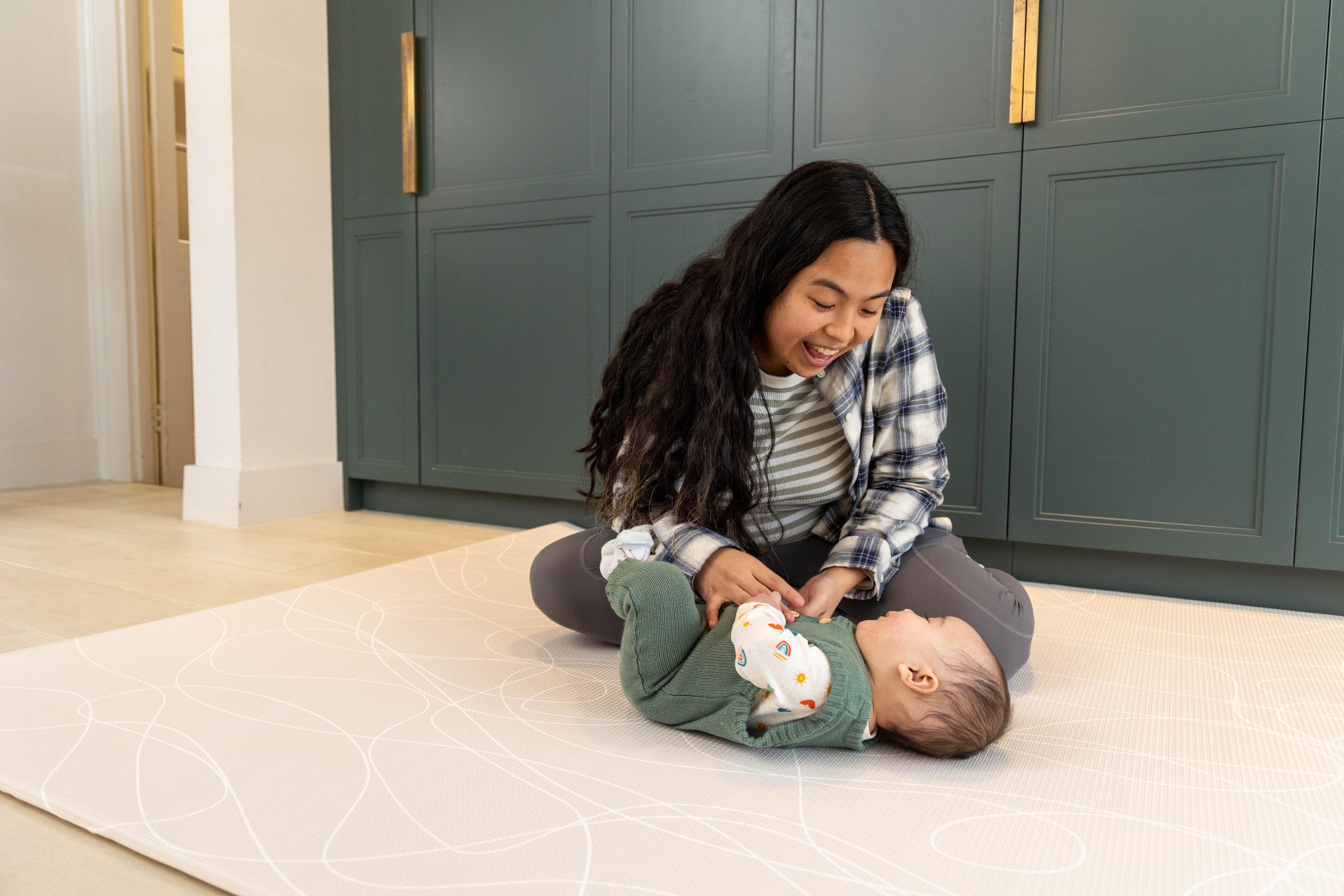 Tiny Trekker reversible foam playmat with toddler-safe materials