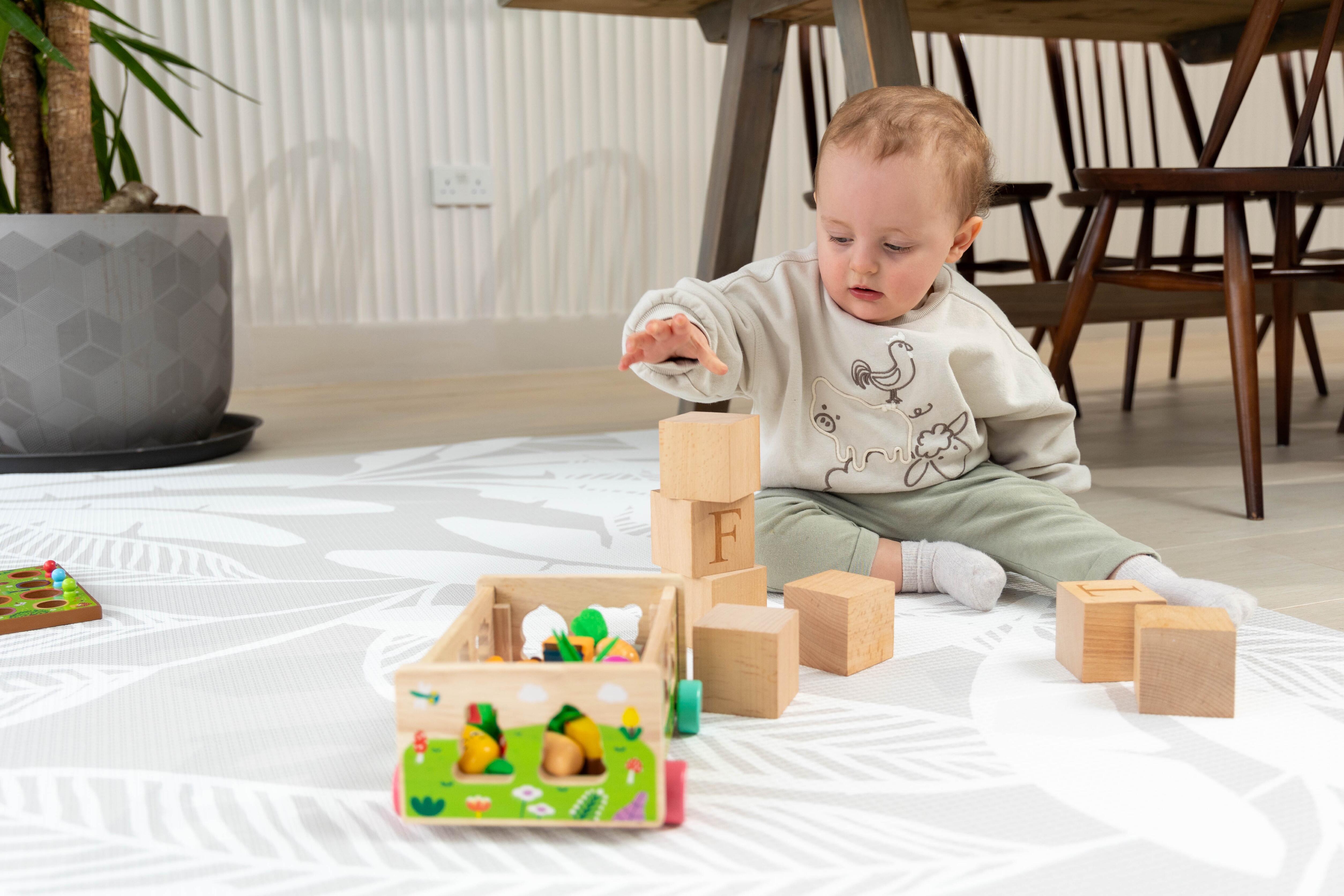 Scandi Bare Palms reversible baby playmat – elegant neutral design offering comfort, safety and style by Little Fae
