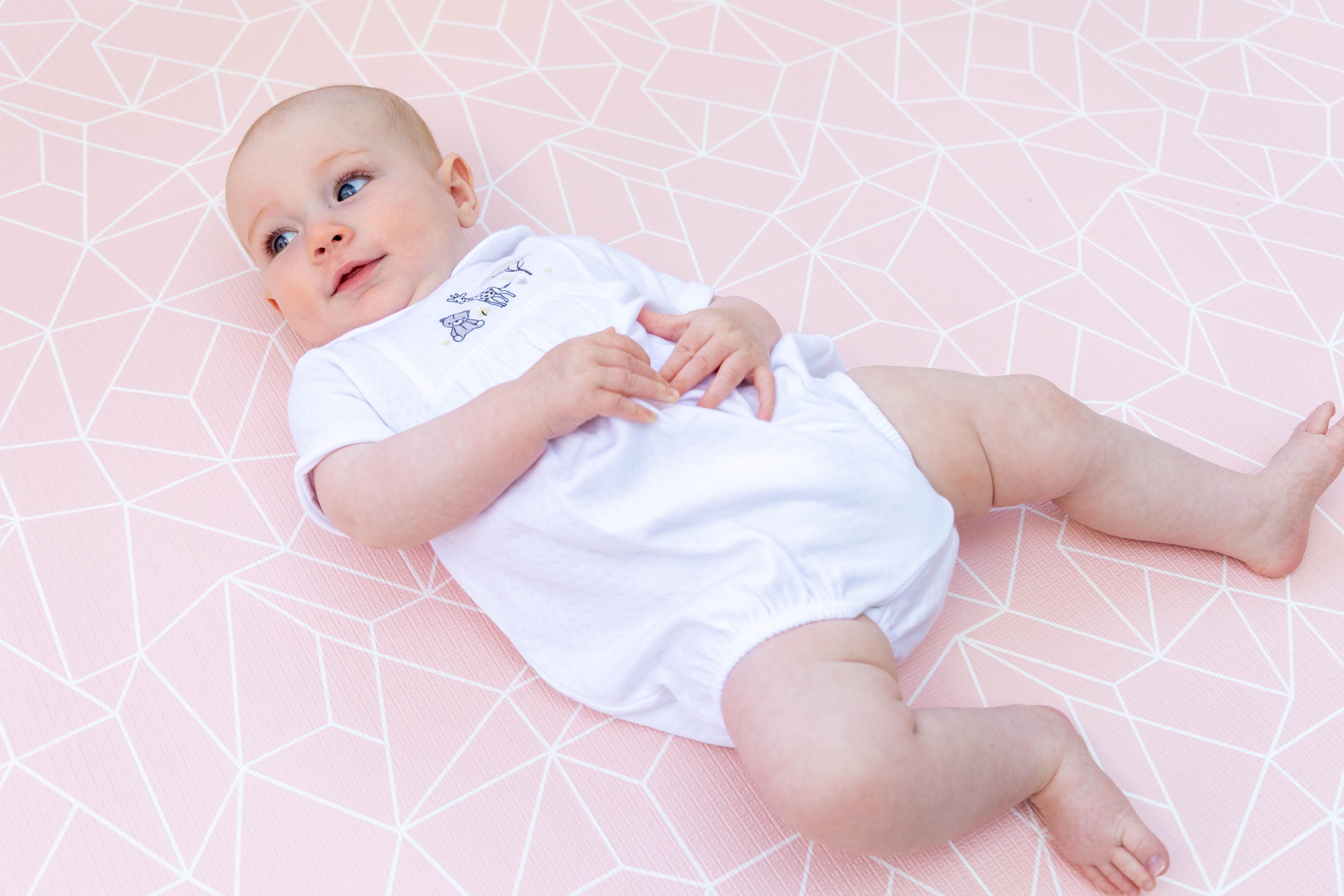 Lifestyle image of Blush Pink Nordic Explorer Playmat – reversible cushioned foam baby mat for contemporary interiors