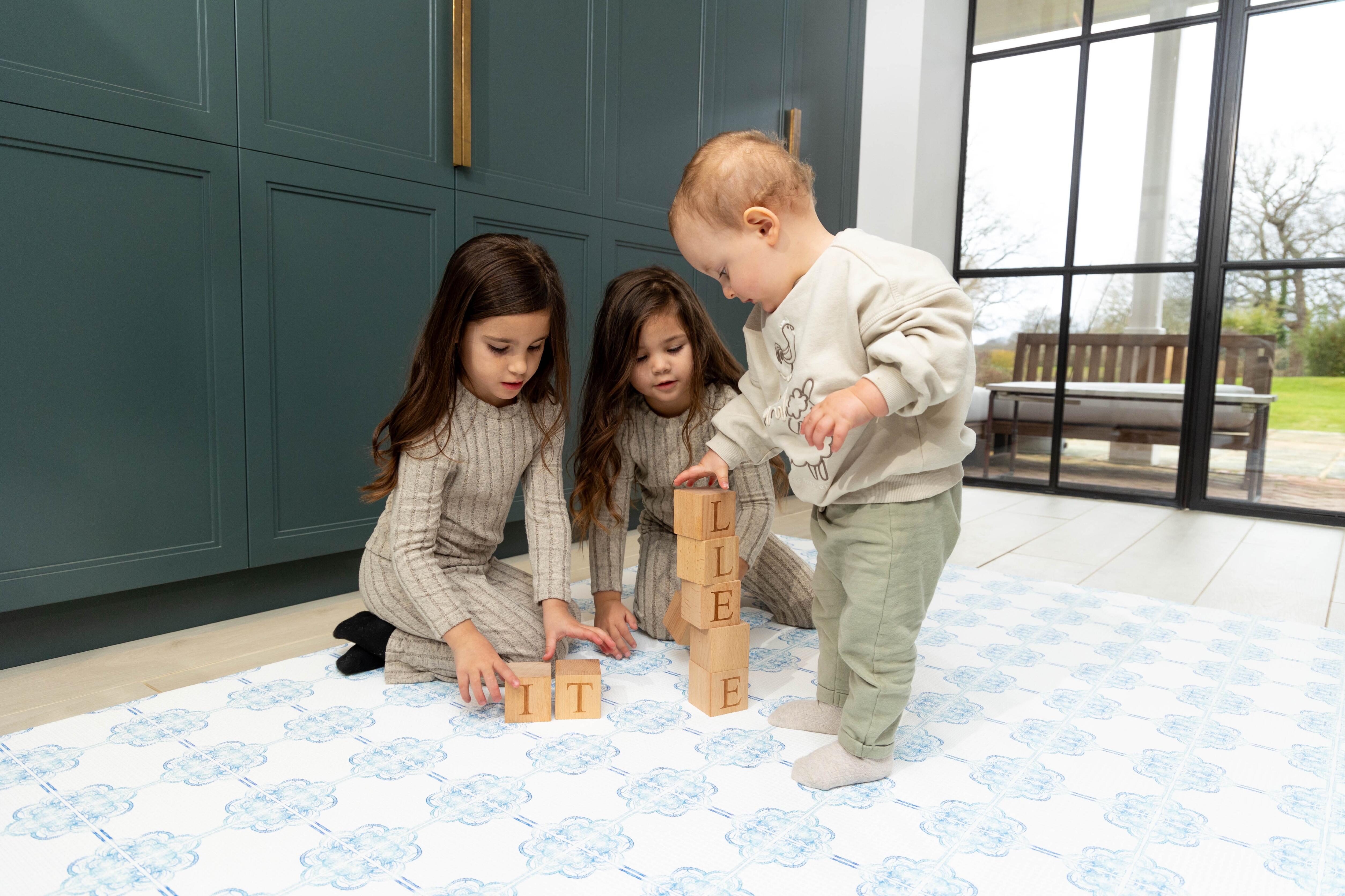 Reversible Santorini Breeze playmat – premium cushioned baby floor mat with calm Mediterranean-inspired palette