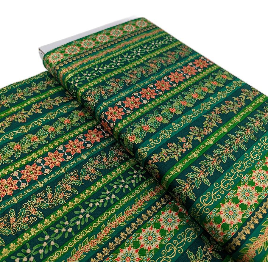 Makower Adorn, a traditional style Christmas fabric featuring gold metallic highlights.