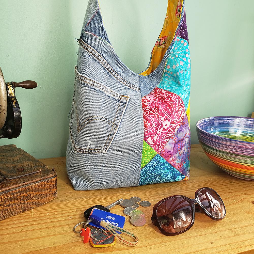 FuzzBag upcycled denim bag,moda,bermuda batiks,patchwork denim, jeans,bag,handbag,flowers