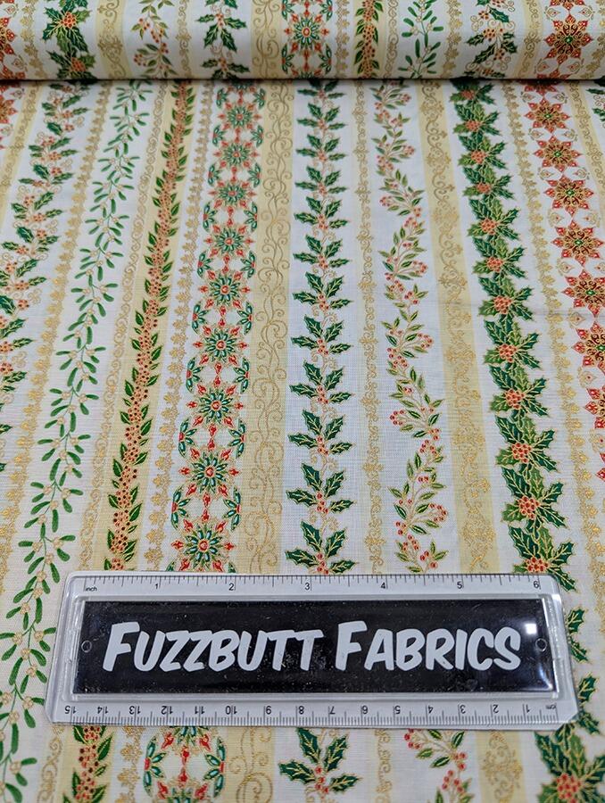Makower Adorn, a traditional style Christmas fabric featuring gold metallic highlights.