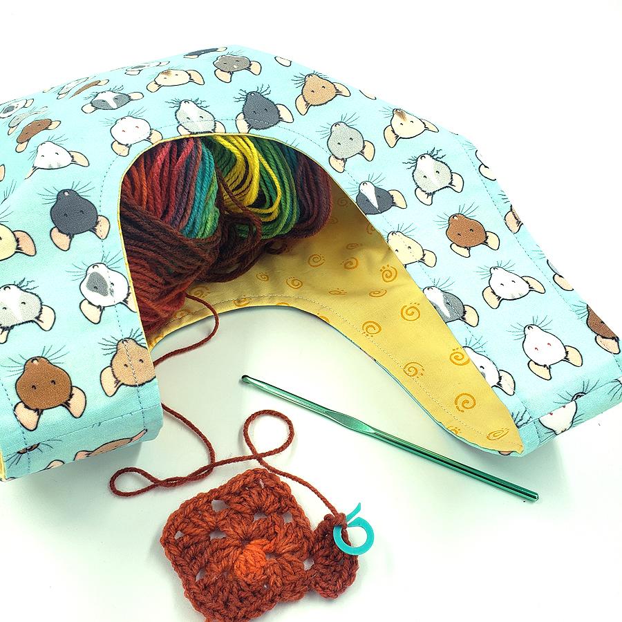 Gorgeous Japanese knot Bag wrist bag made with Spoonflower Silly Badger Designs fabric adorned with cute rattie faces