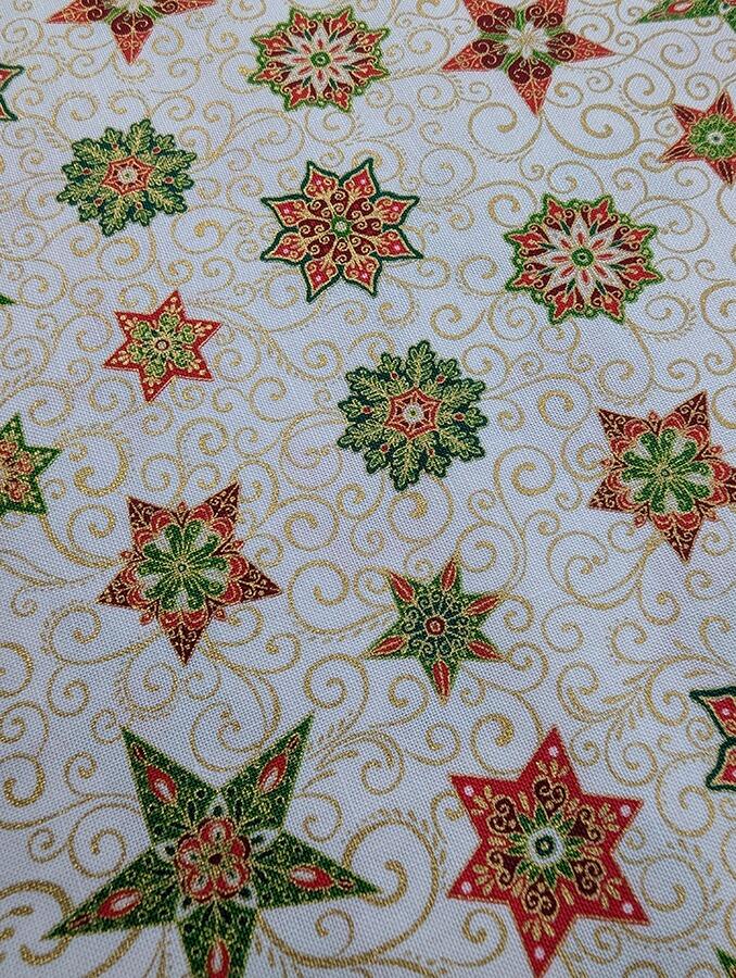 Makower Adorn, a traditional style Christmas fabric featuring gold metallic highlights.