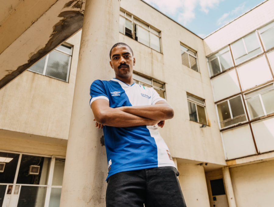 Person standing in front of a building wearing the shirt.