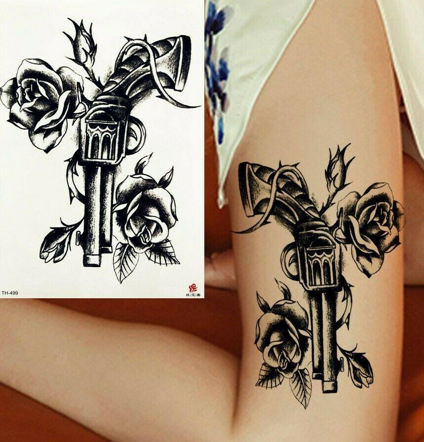 Guns And Roses Thigh Tattoo