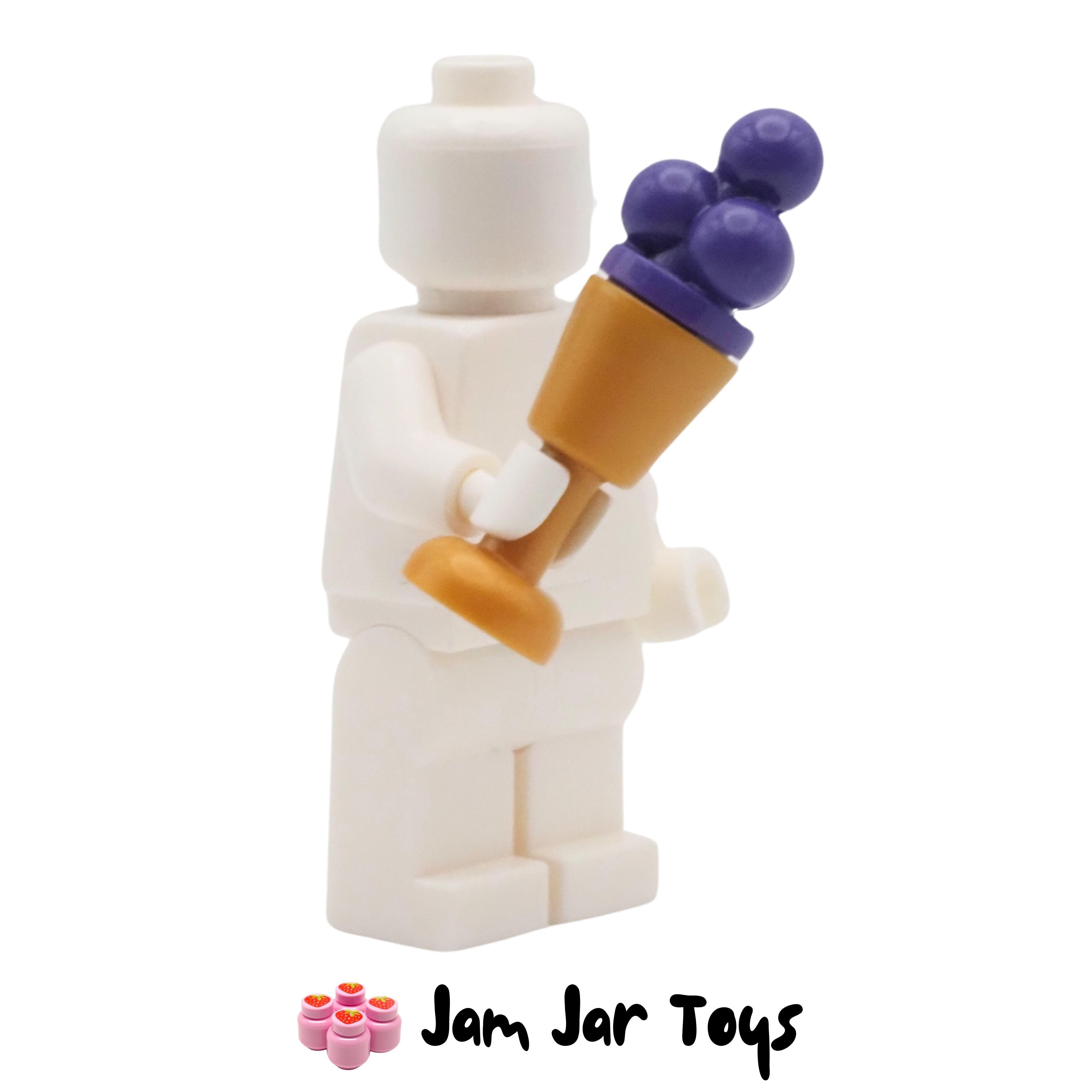 LEGO Pearl Gold Goblet With Dark Purple / Grape Ice Cream.