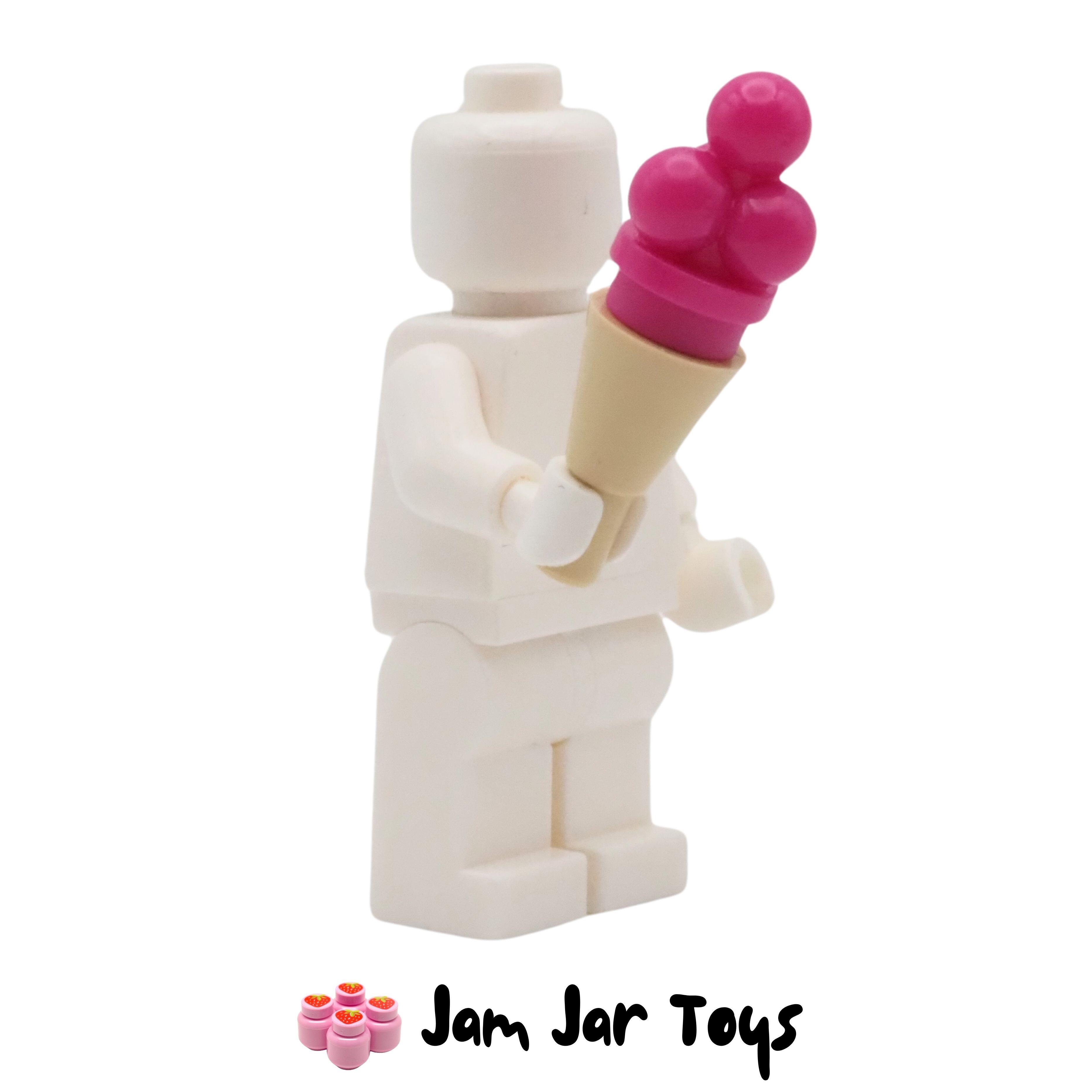 Tan Cone with Magenta / Raspberry Ice Cream.