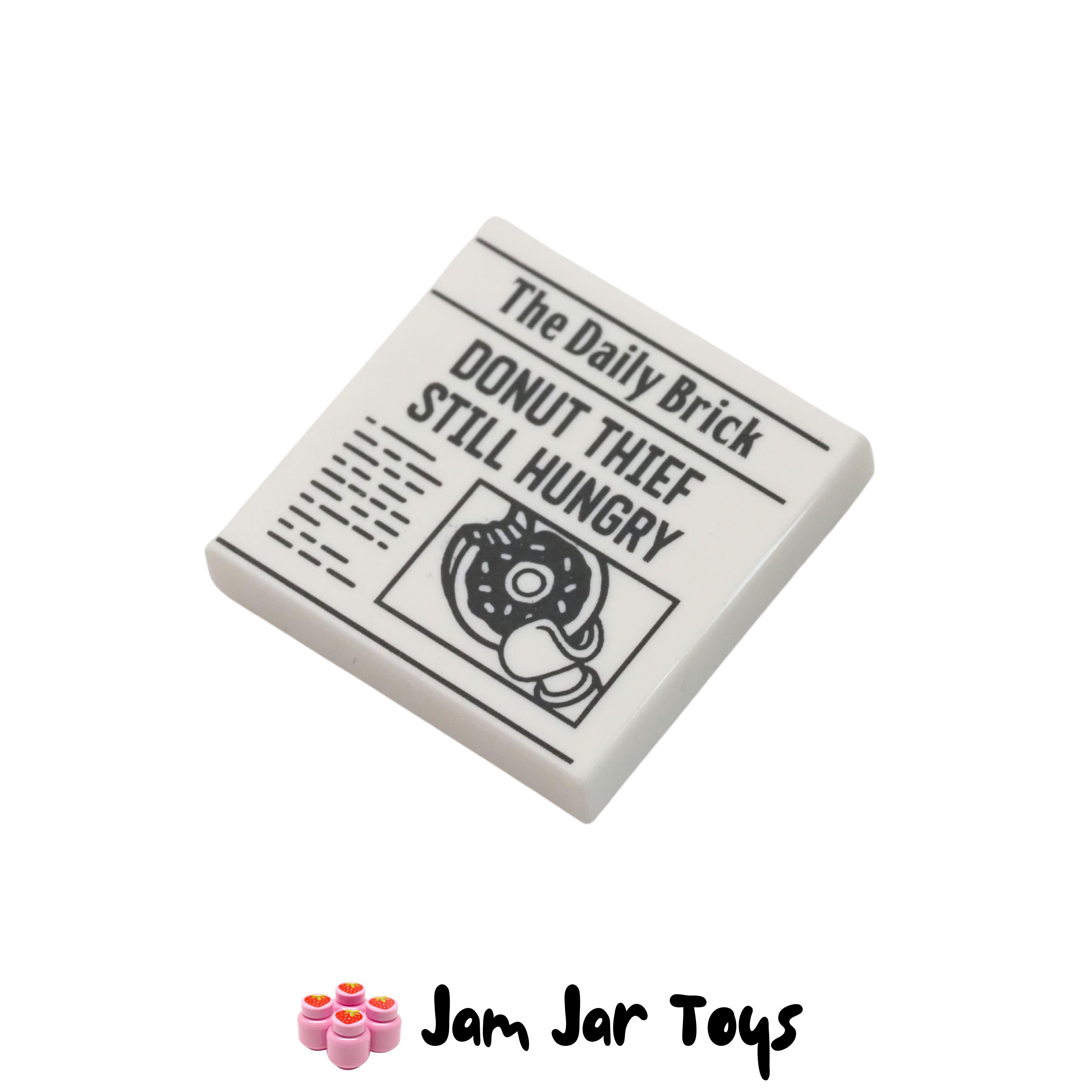 LEGO White Tile, The Daily Brick Newspaper with Donut Thief Still Hungry Headline 2 X 2.