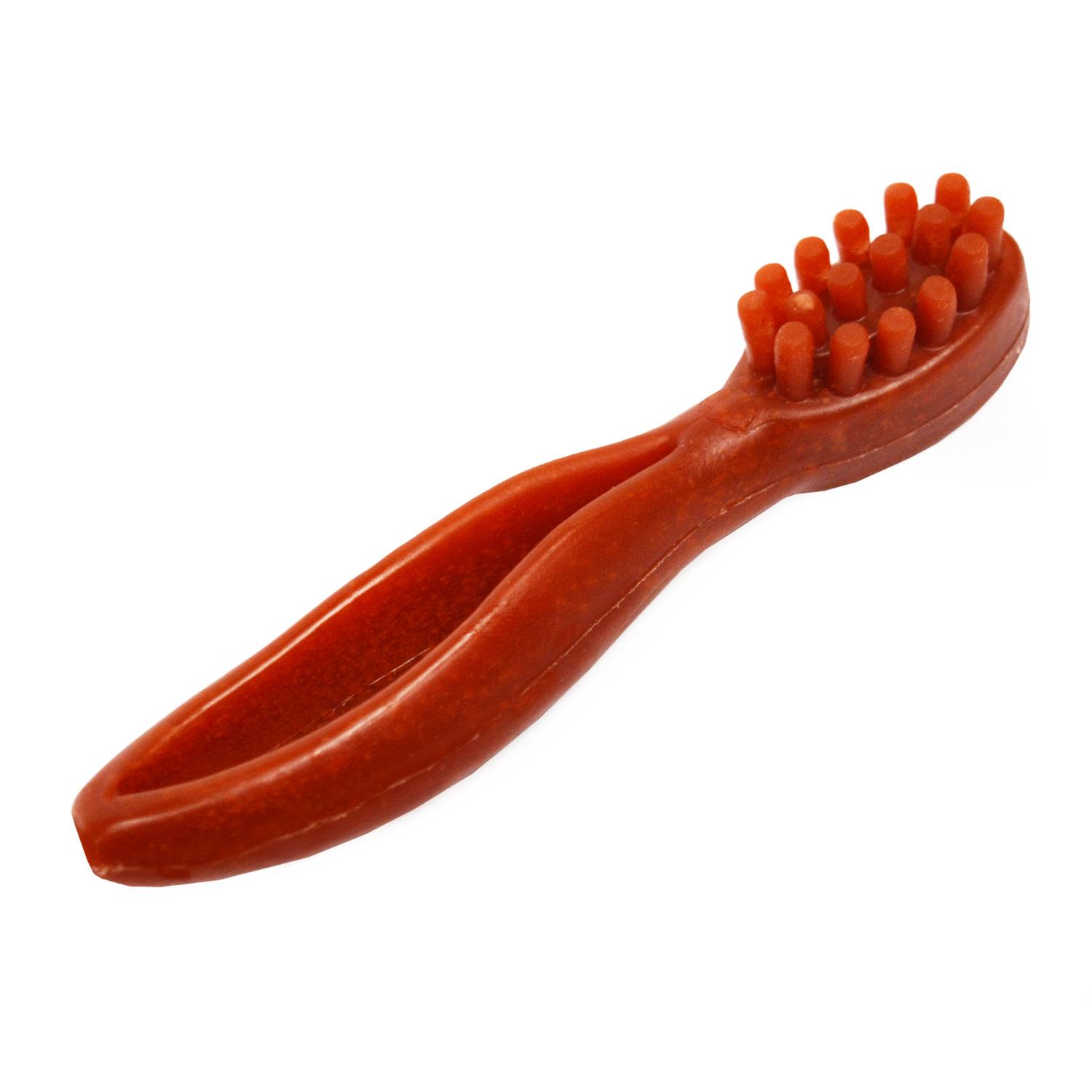 A large red Cerea toothbrush shaped vegan dog chew