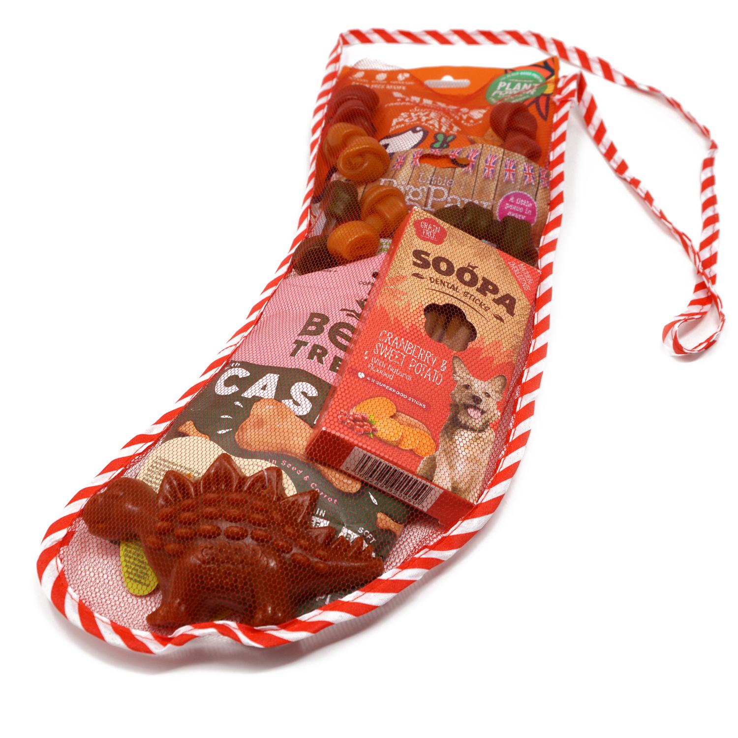 An close up of a Christmas Dog Stocking Filled with plant-based dog treats