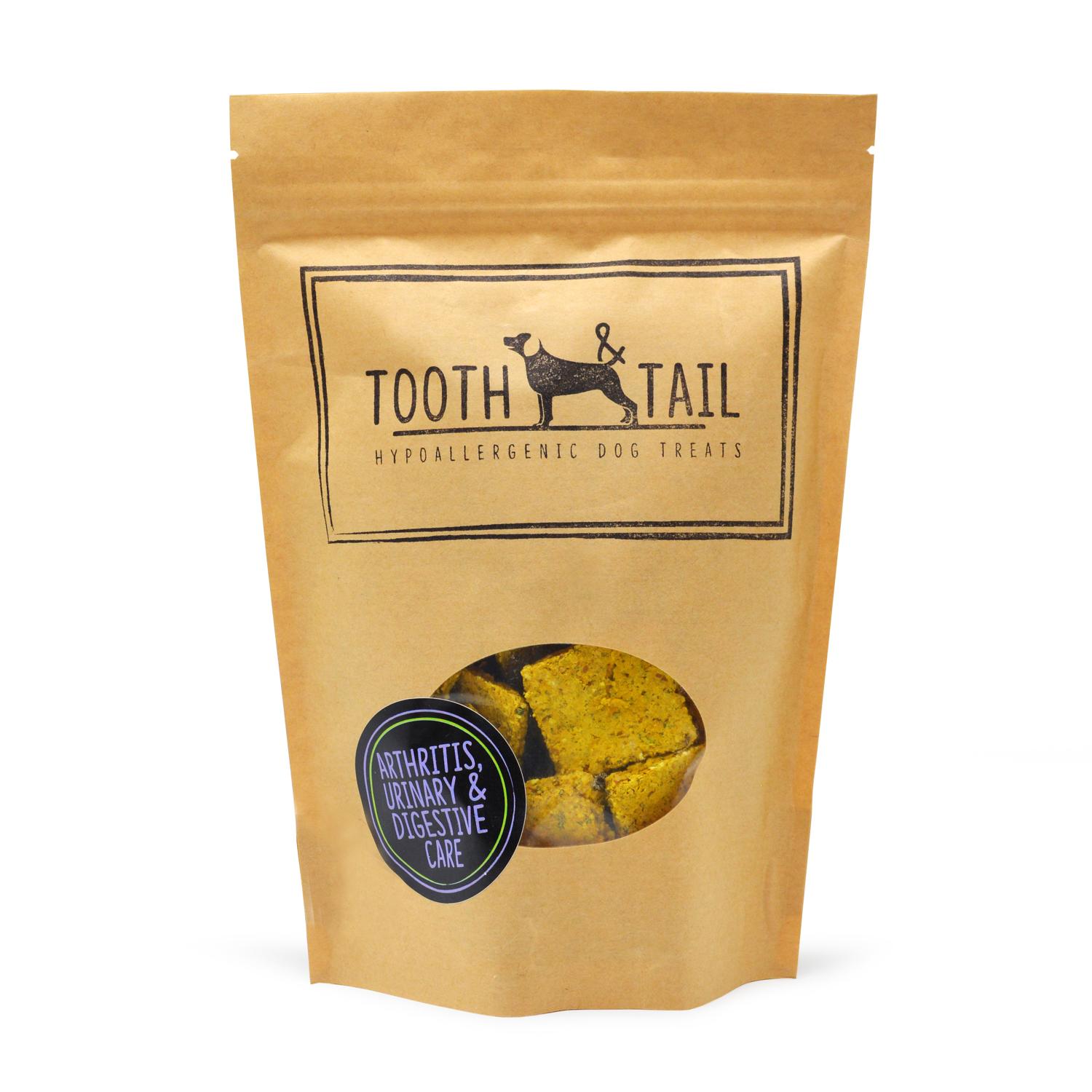 Front of a pack of Tooth and Tail Arthritis, Urinary and Digestive Care vegan dog biscuits